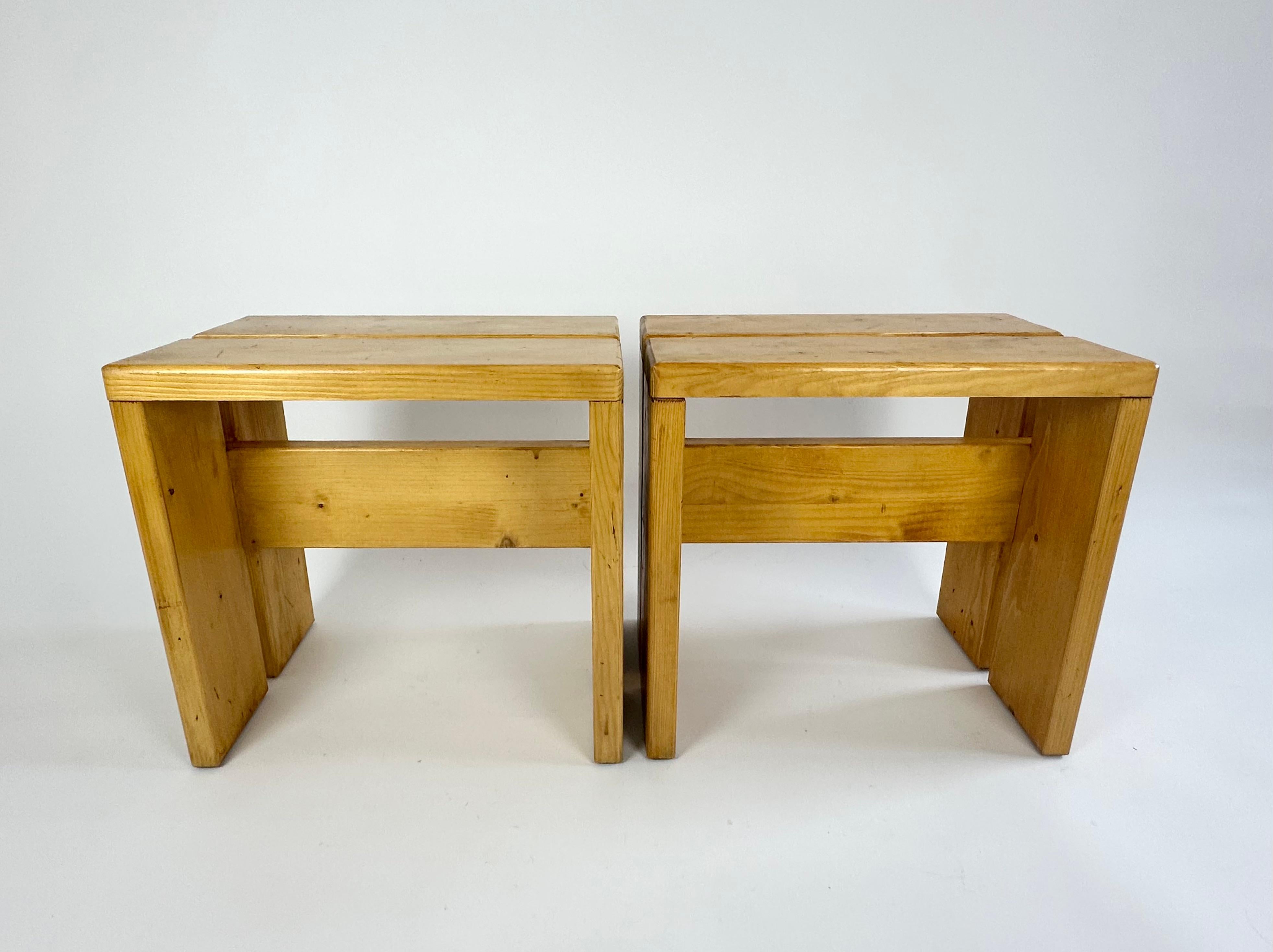 Stool/side tables selected by Charlotte Perriand for the Les Arcs resort. France, 1970s.

Made of pine. No structural damage or old repairs, very solid.

Great original condition with wear and patina as pictured, nice rich wood tone. Cleaned, ready