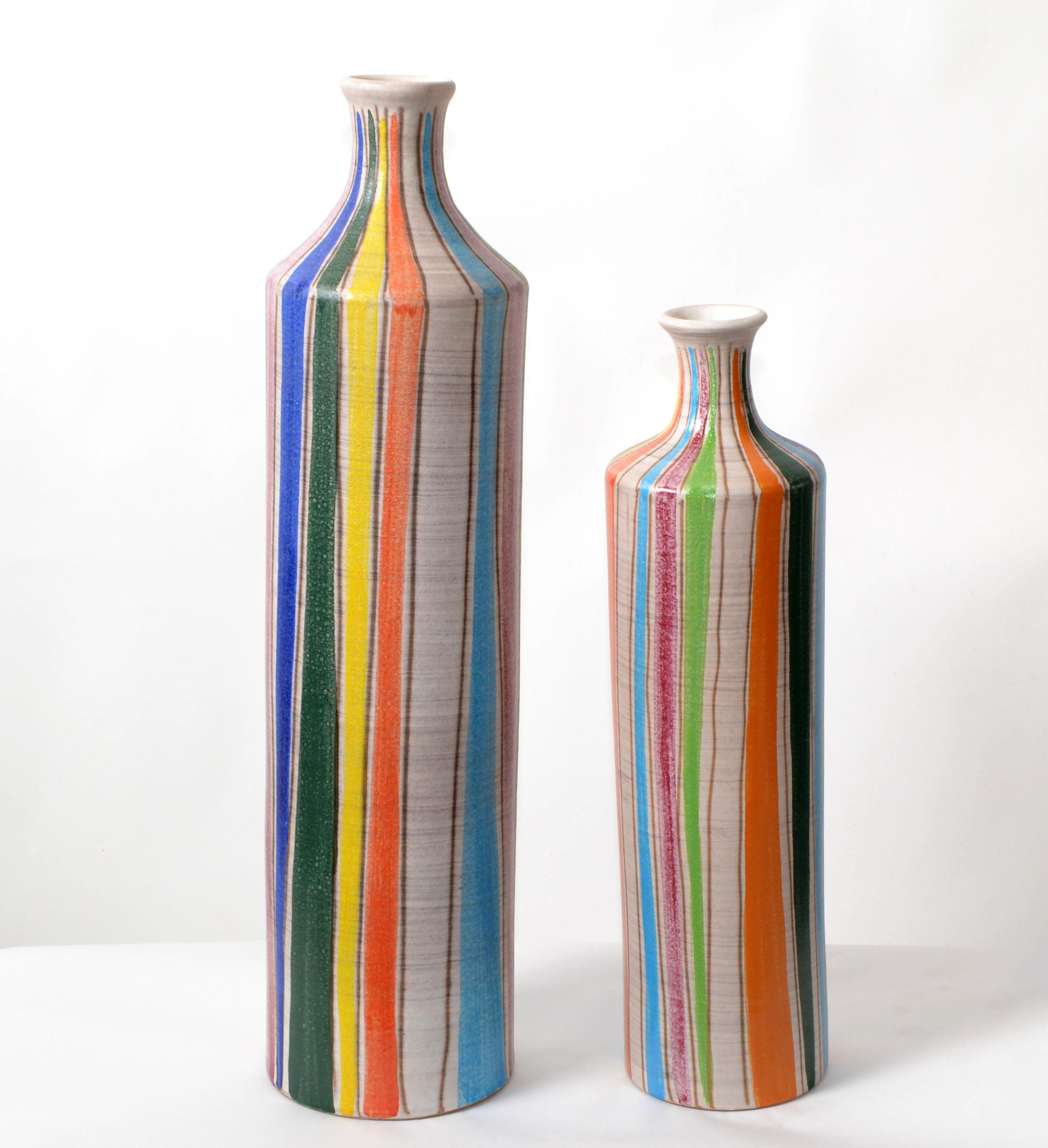 Studio A Italy, Mid-Century Modern glazed striped Set of ceramic vases, pottery in a tall round vessel shape.
Marked at the base, Studio A, Made in Italy.
The smaller wheat vase measures 4.25 diameter x 16.38 inches Height.
