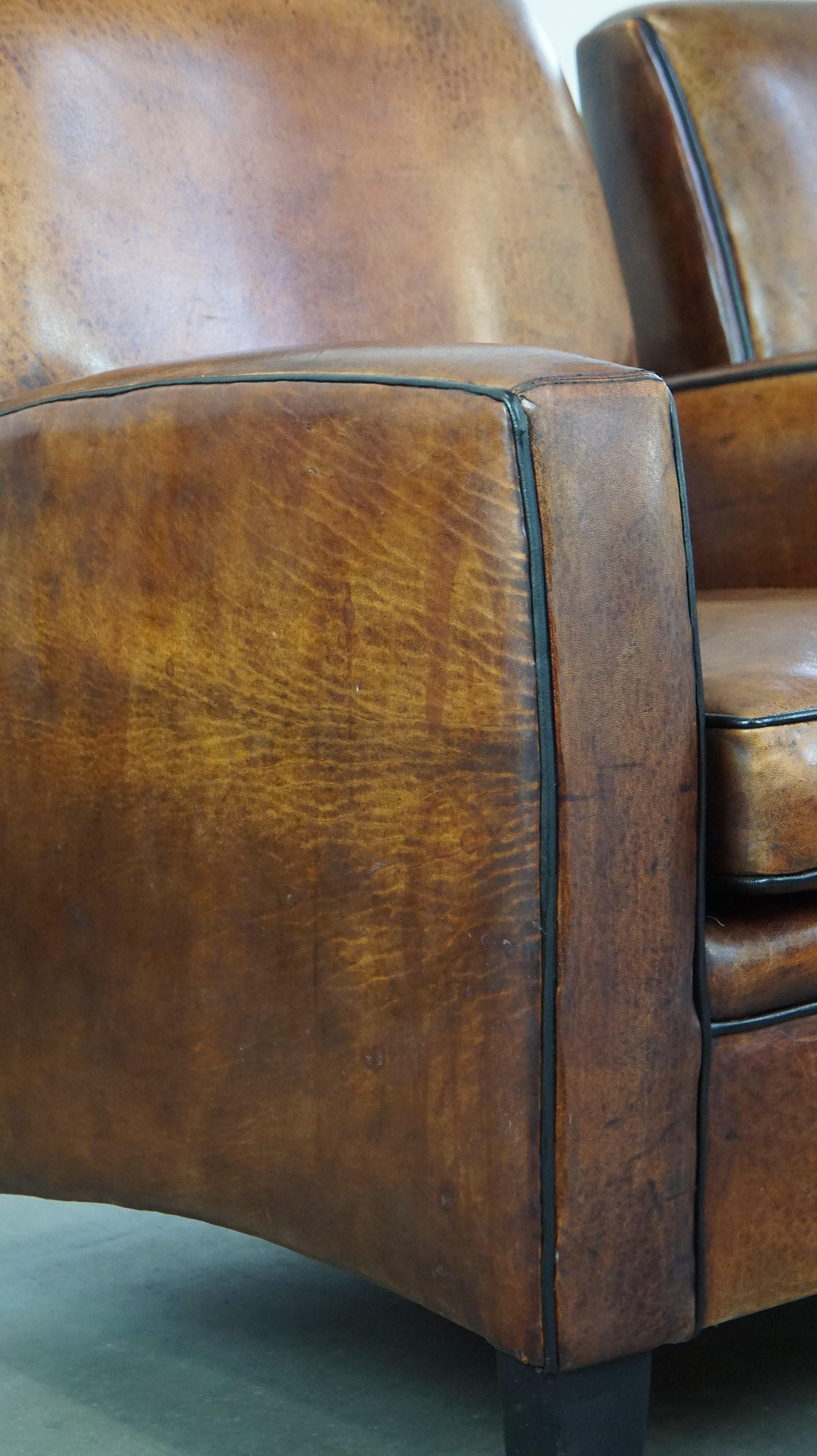 Set di 2 poltrone robuste ma comode in pelle di pecora dal design elegante in vendita 5