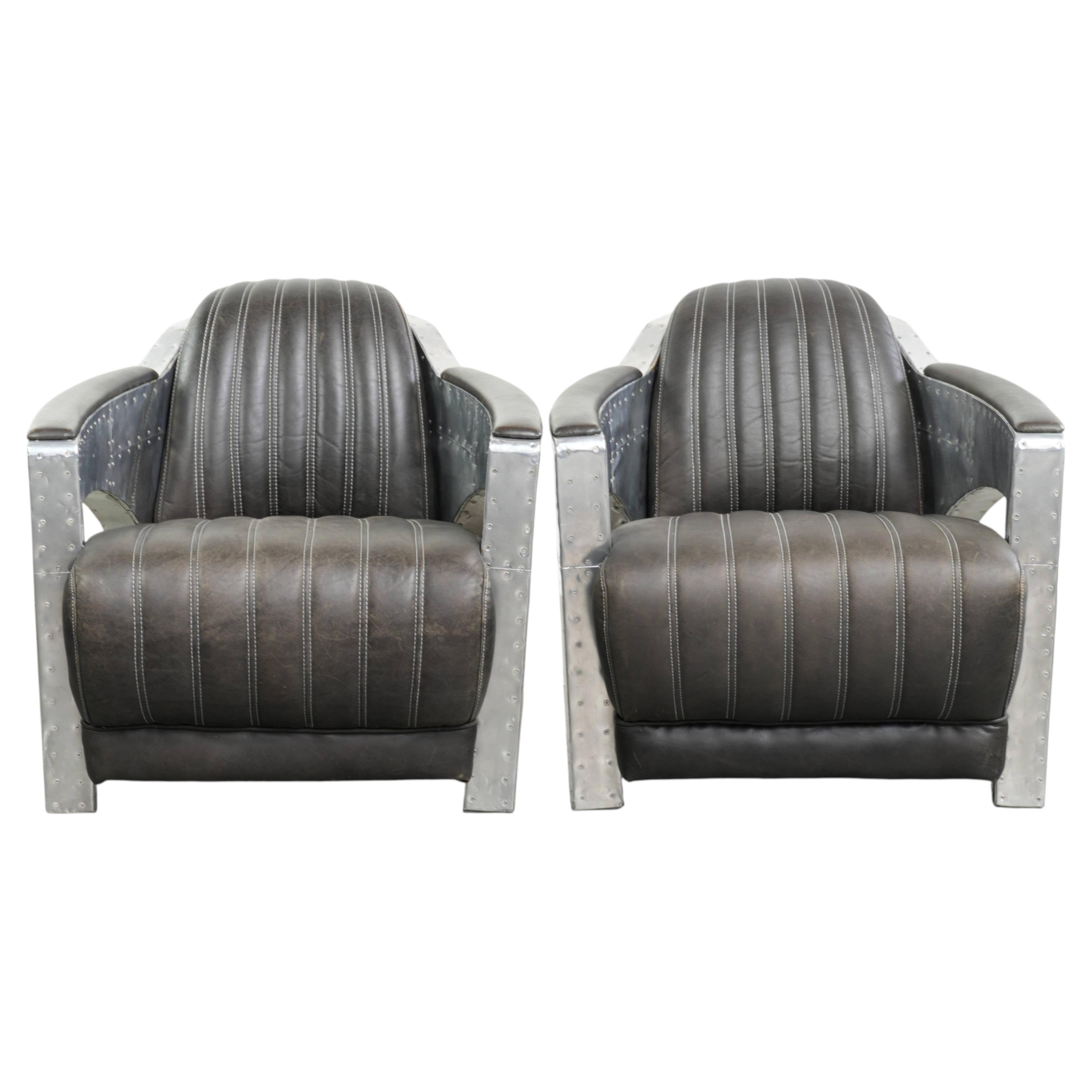Set of 2 sturdy industrial black cowhide Aviator design armchairs For Sale