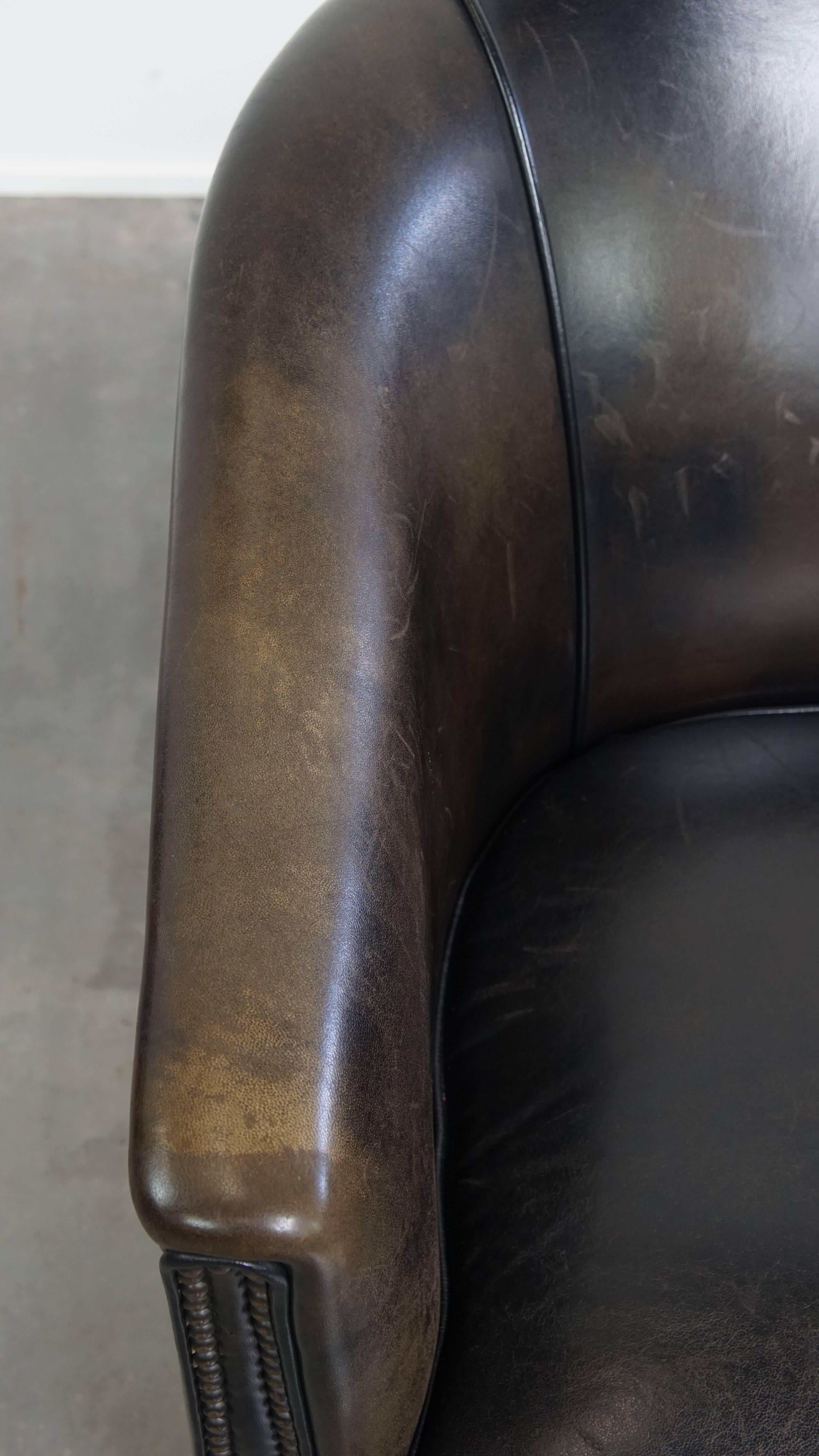 Juego de 2 sillones club de piel de cordero sutil negro/gris Cuero en venta