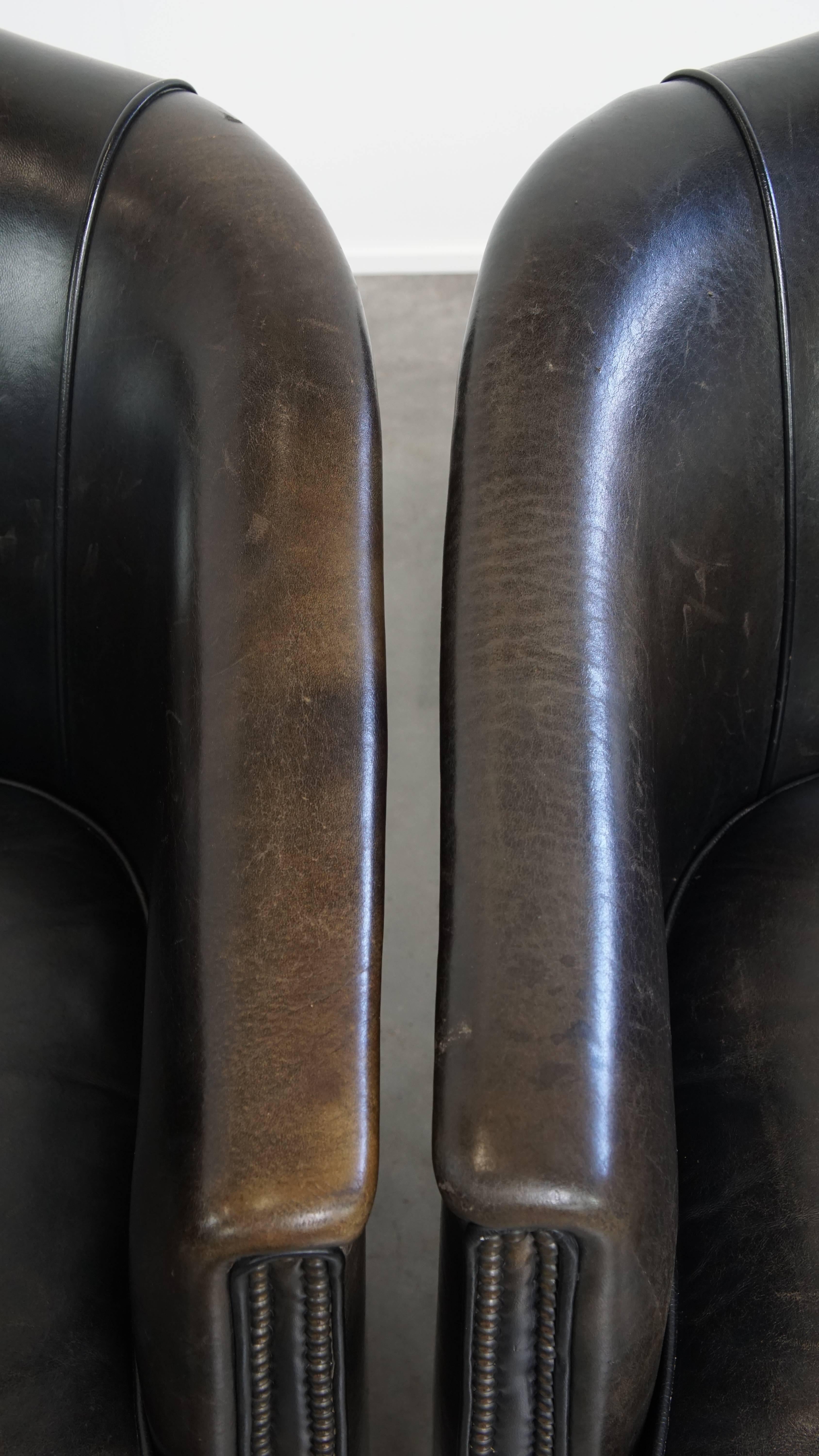 Juego de 2 sillones club de piel de cordero sutil negro/gris en venta 1