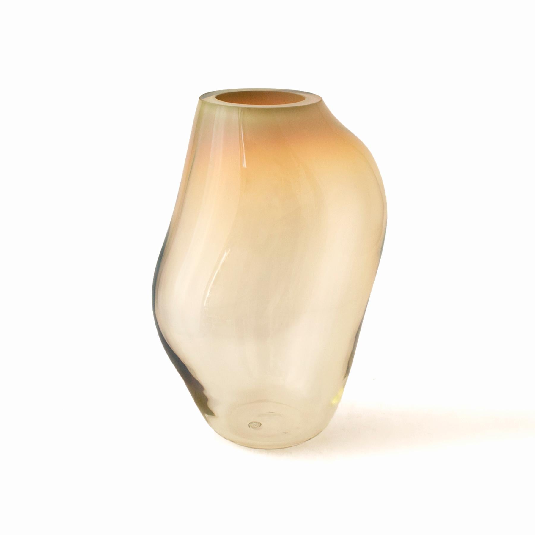 Set of 2 supernova iv amber iridescent m vases by Eloa.
No UL listed 
Material: glass.
Dimensions: D15 x W 17 x H 36 cm.
Also available in different colours and dimensions.

Supernova is a collection of vases and bowls that, though they don‘t