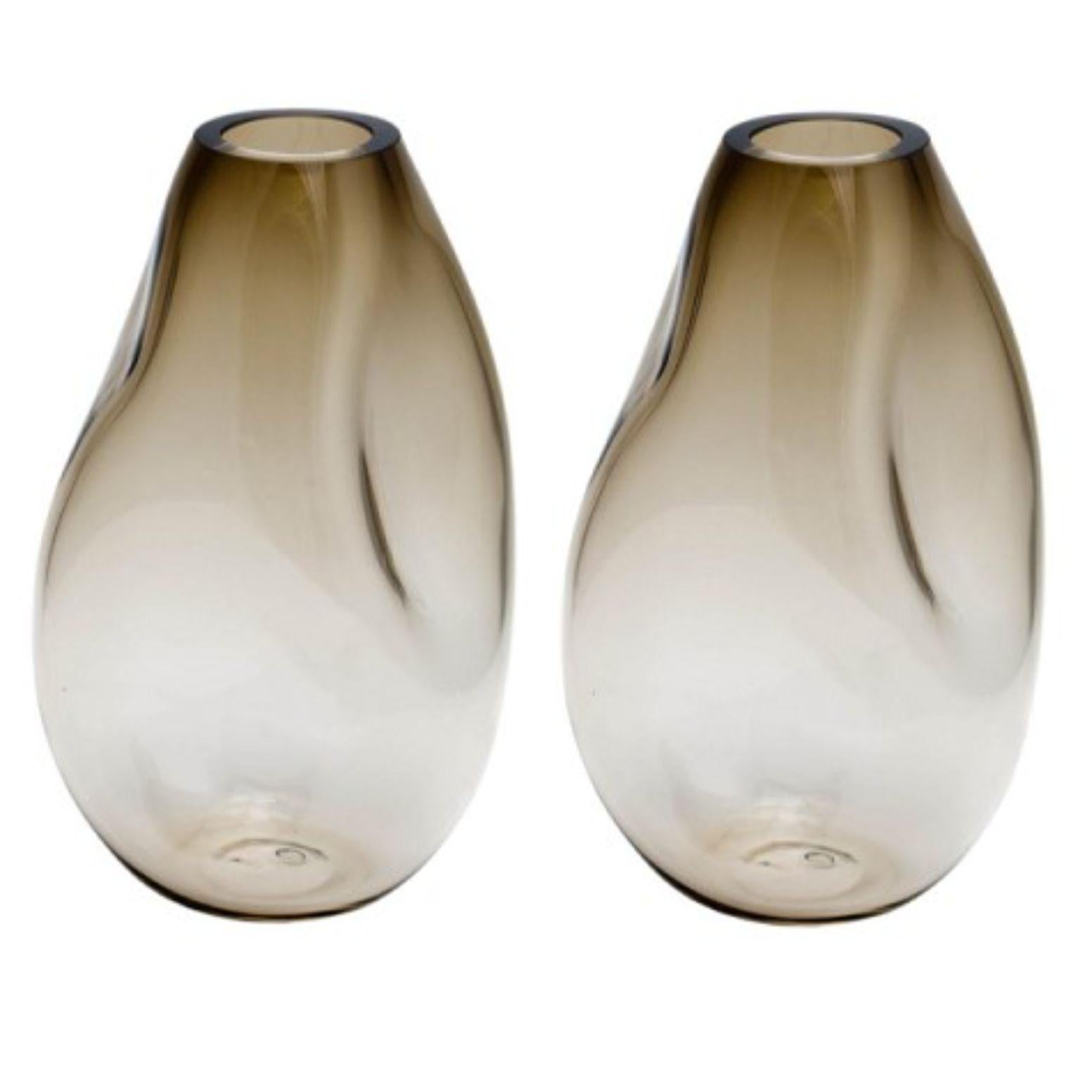 Set of 2 Supernova IV Silver Smoke L Vases by Eloa.
No UL listed 
Material: Glass
Dimensions: D15 x W17 x H41 cm
Also Available in different colours and dimensions.

SUPERNOVA is a collection of vases and bowls that, though they don‘t
