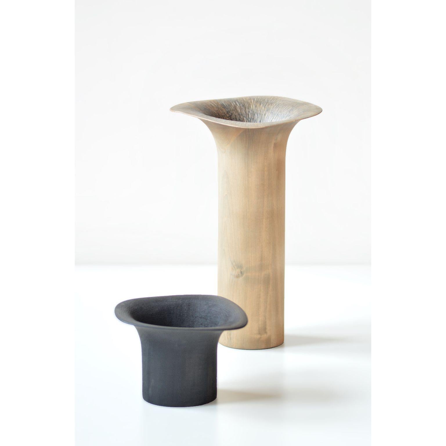 Sussin sculpture - Large - Dark by Antrei Hartikainen
Materials: Linden wood, natural, oil wax, stain, lacquer
Dimensions: 
Width 18- 35 cm
Depth 18- 35 cm
Height 20 - 120 cm

Also Available: different color & sizes

Sisin ( finnish for