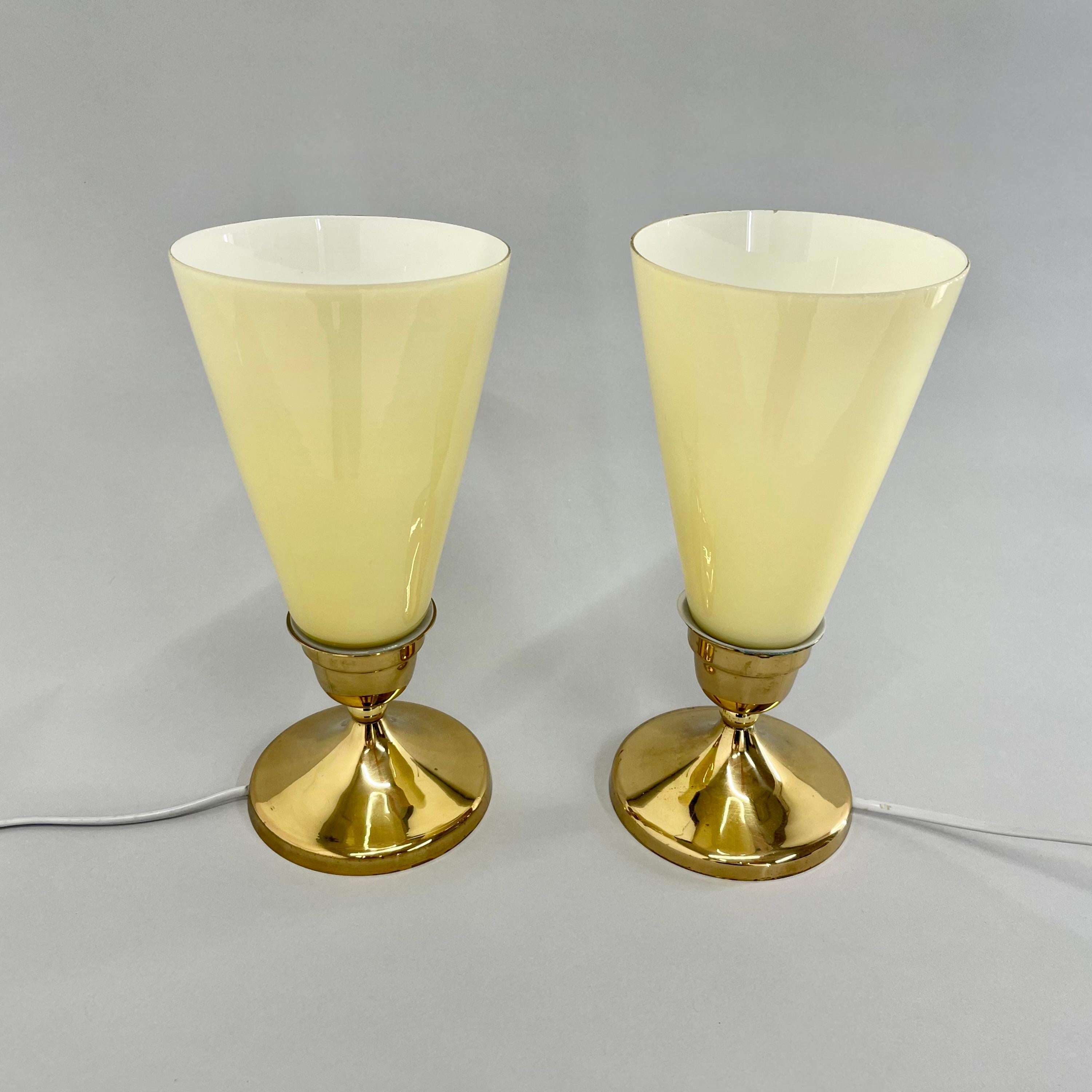Pair of mid-century table or bedside lamps, produced by Kamenicky Senov Glassworks in former Czechoslovakia in the 1960's.