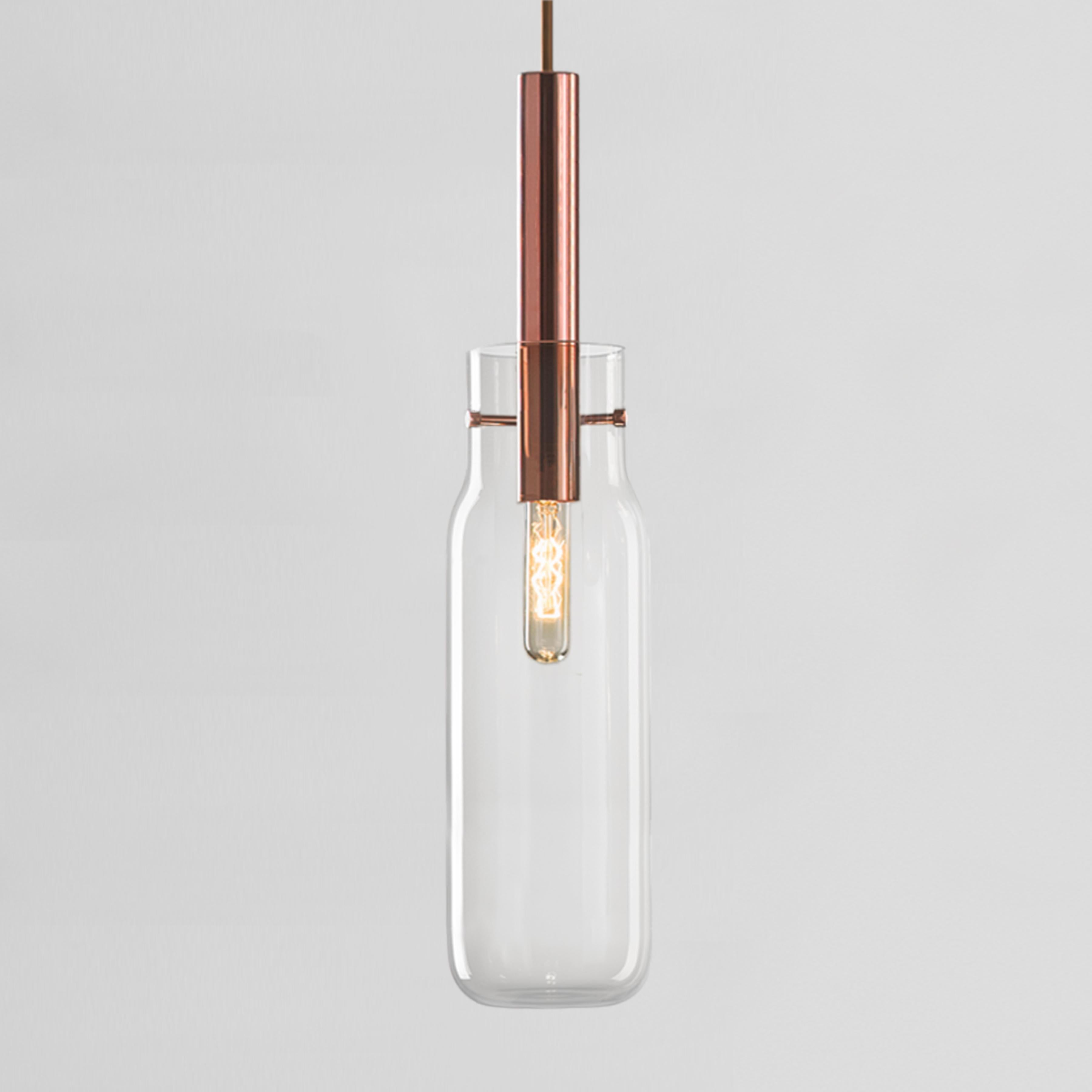 Tall Bandaska pendant light by Dechem Studio
Dimensions: D 9 x H 180 cm.
Materials: brass, glass.
Also available: different colours and sizes available.

Hand-blown into beech wood moulds, Bandaska Lights is based on the highly popular Bandaska