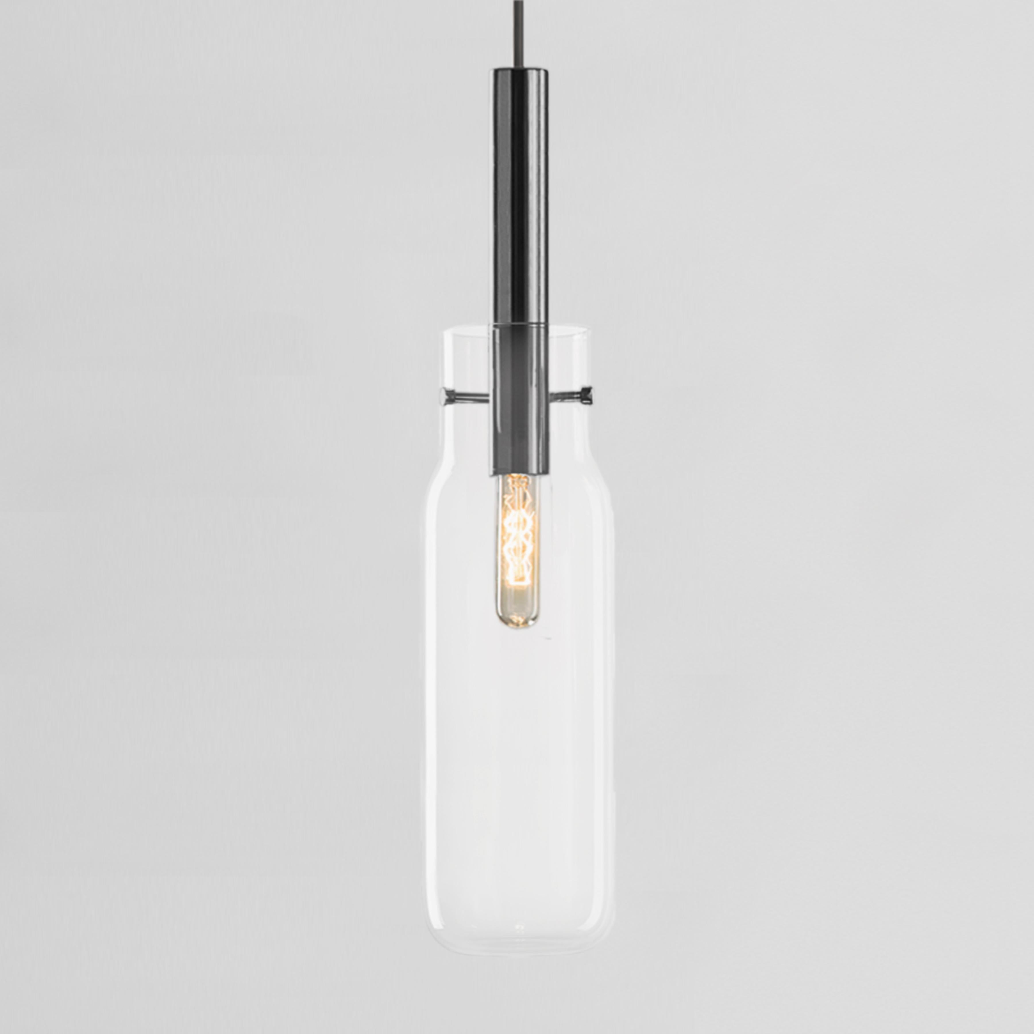 Tall Bandaska Pendant Light by Dechem Studio
Dimensions: D 9 x H 180 cm
Materials: Brass, Glass.
Also Available: Different colours and sizes available.

Hand-blown into beech wood moulds, Bandaska Lights is based on the highly popular Bandaska