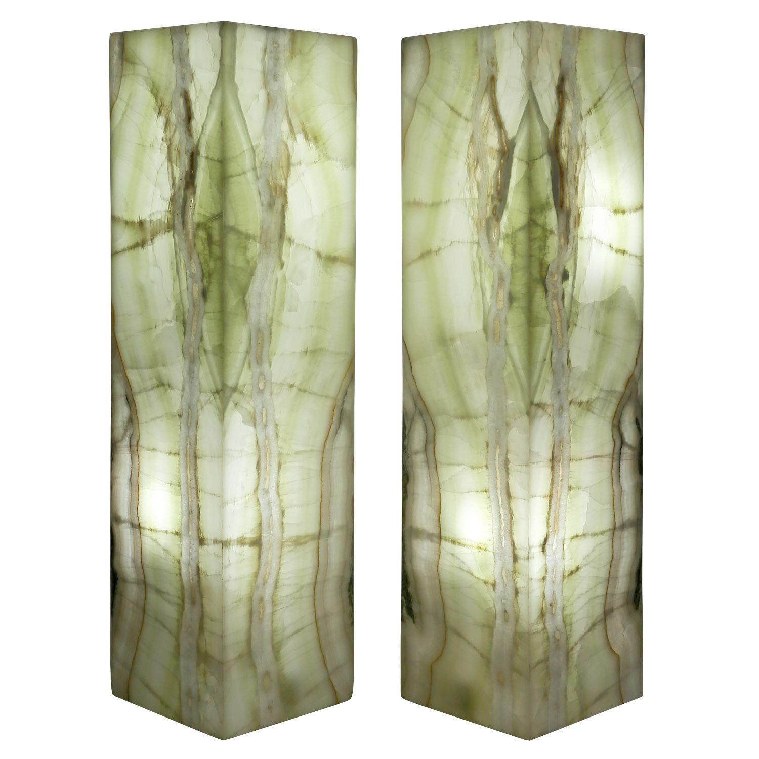 Set of 2 Tall Natural Onyx Table Lamps

Natural Polished Onyx
5-sided, open in the bottom to facilitate changing the bulbs
Measures: 32 x 8 x 8 in. / 81 x 20 x 20 cm
These pale green lamps are an excellent way to create ambiance and provide