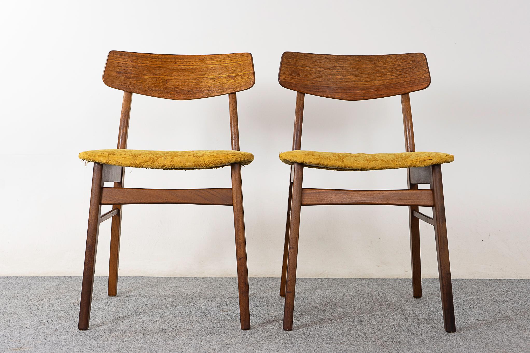 Teak mid-century dining chairs, circa 1960's. Beautifully curved teak backrests and generous seat design. Beech frame with removable seat pad for easy reupholstering!

Unrestored item with option to purchase in restored condition for an additional