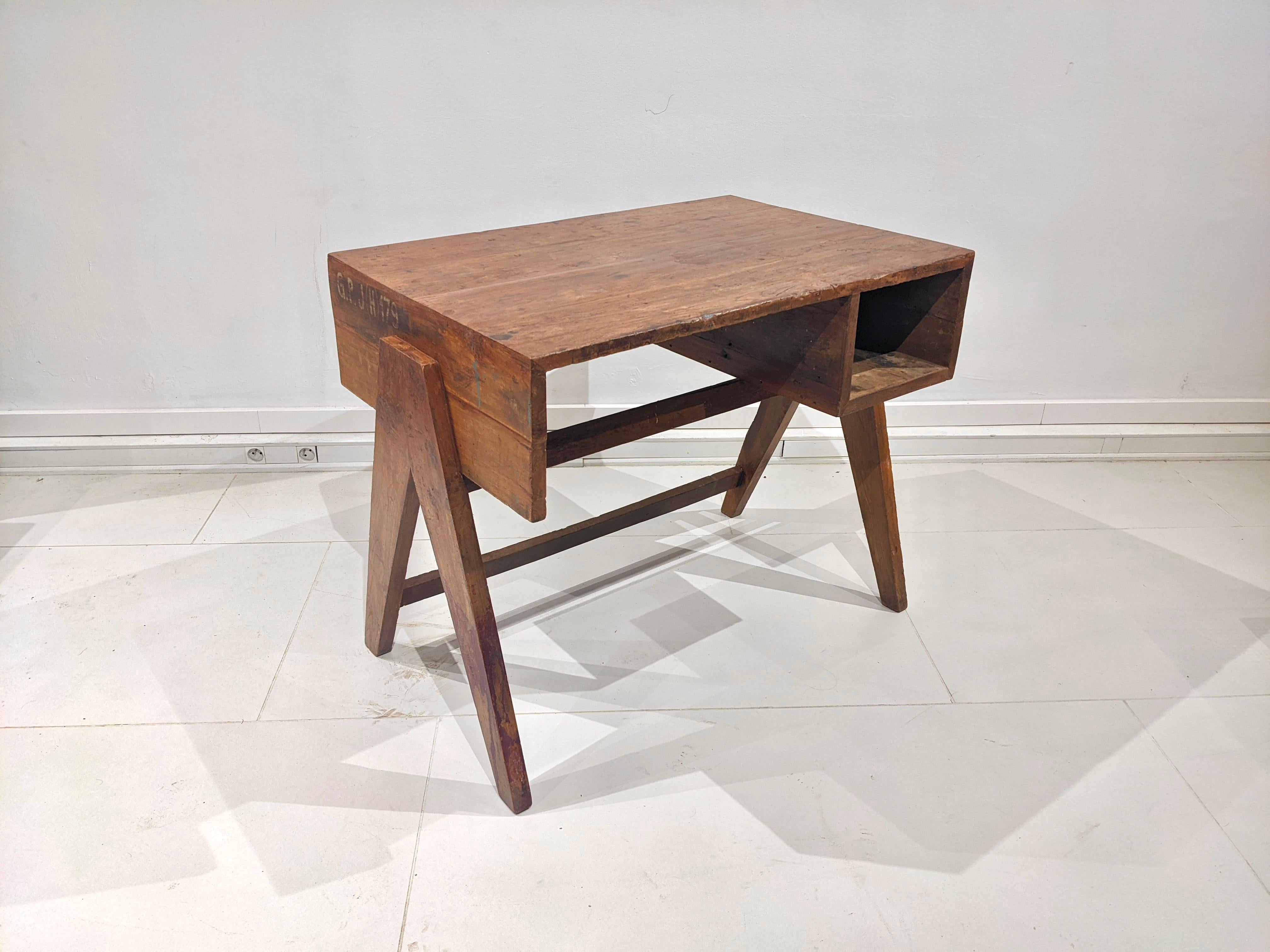 Set of 2 teak desks by Jeanneret. 
Good condition. Traces of wear due to age and use (see photos of the top).
Possibility to restore the desks on request.
 Circa 1960. 
Dimensions : H73.5 cm x D60 cm x W88 cm.