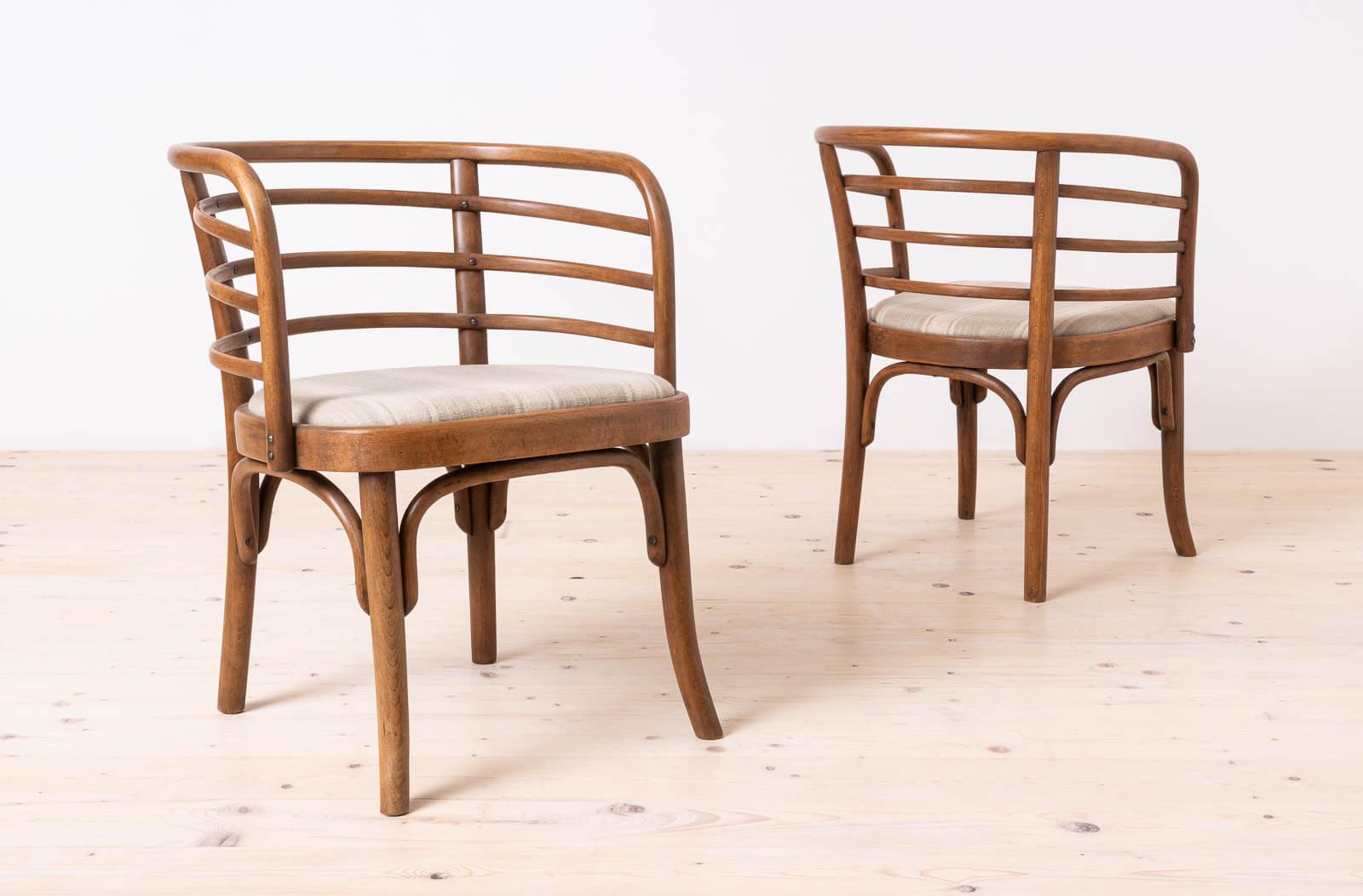 This set of 2 armchairs was produced by Thonet (original paper labels are still under the seats as you may see in the attached picture) and most probably designed by Josef Frank. This particular model was catalogued as model no. B245 or B246,