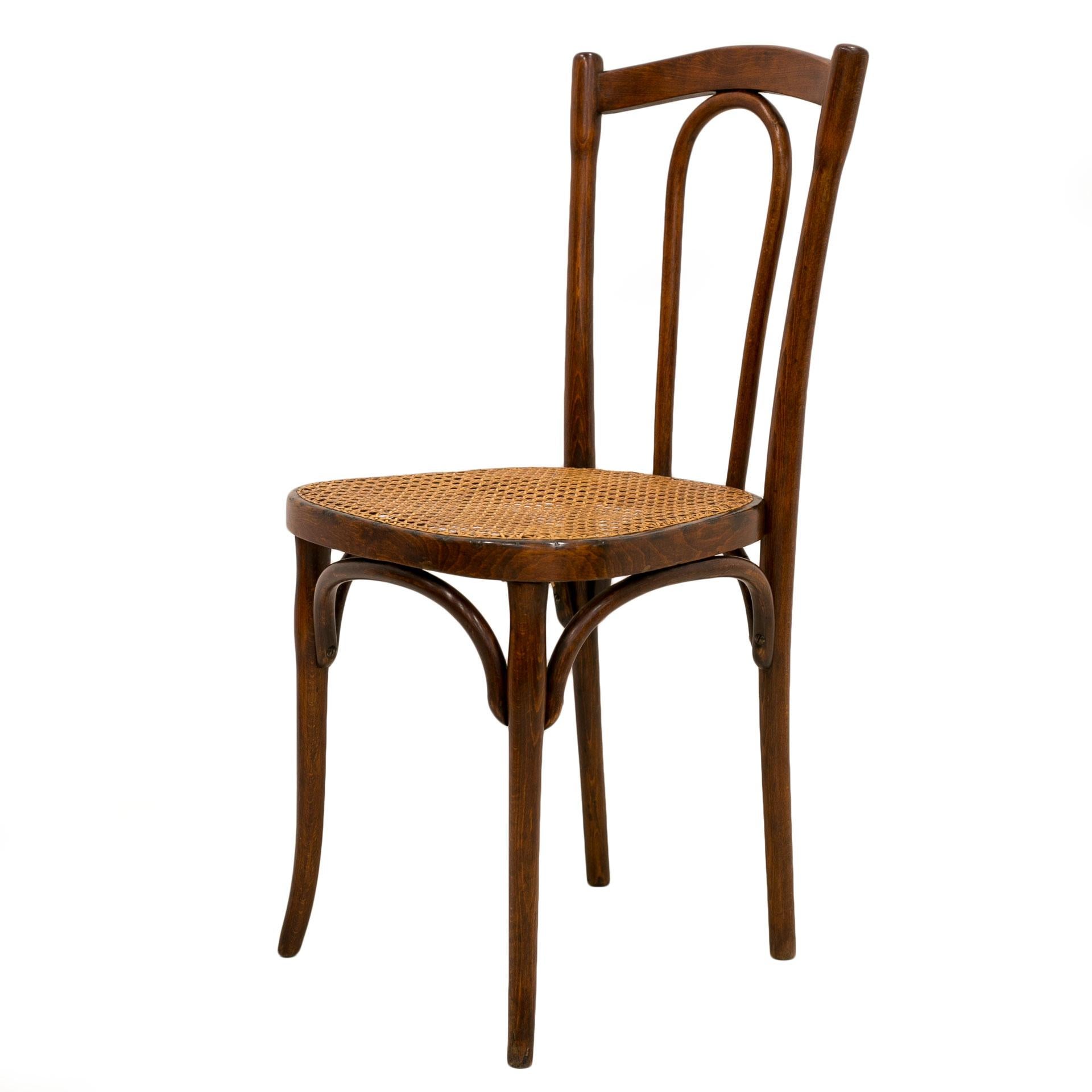 This is a set of classic bentwood chairs by Michael Thonet. The set comes from Austria from 1920s. The chairs are made of beech wood with a traditional cane plaited seating. The chairs are in very good condition, after a subtle renovation.