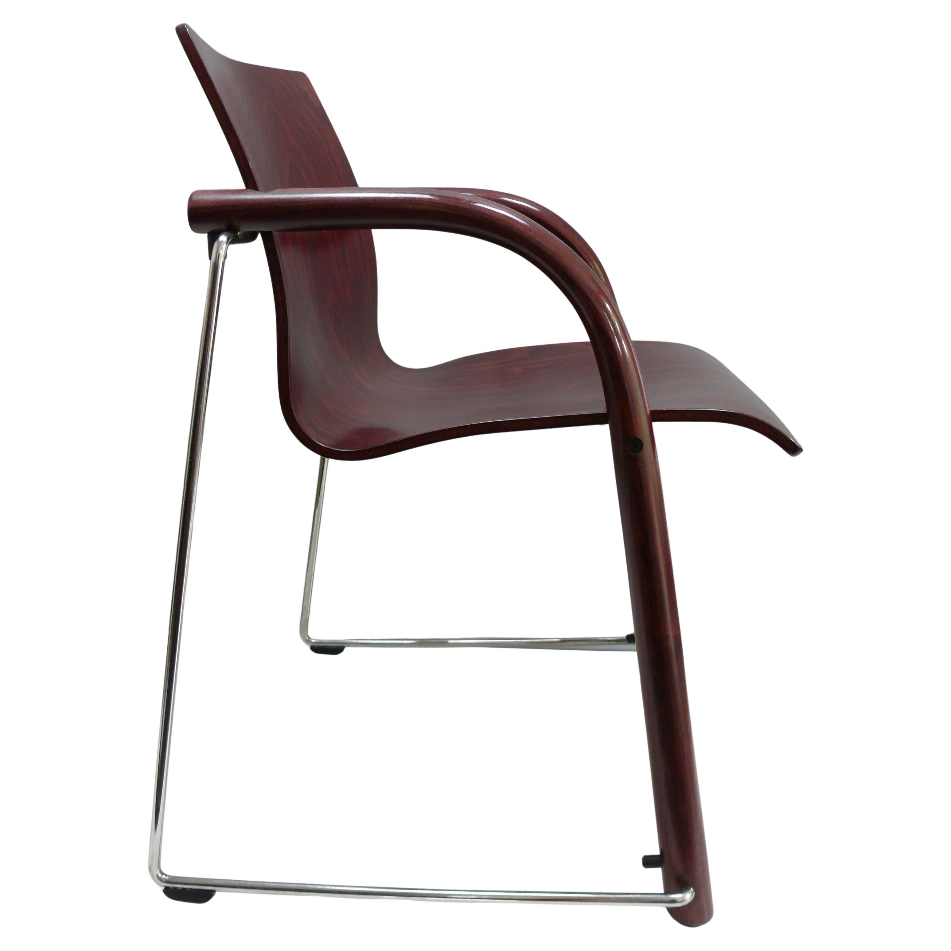 Set of 2 Thonet S 320 Armchairs in stained reddish-brown plywood and chrome plated Steel, Germany, 1980s

A striking set of four original Thonet S 320 armchairs designed by Ulrich Böhme and Wulf Schneider in the late 1980s. These sculptural chairs