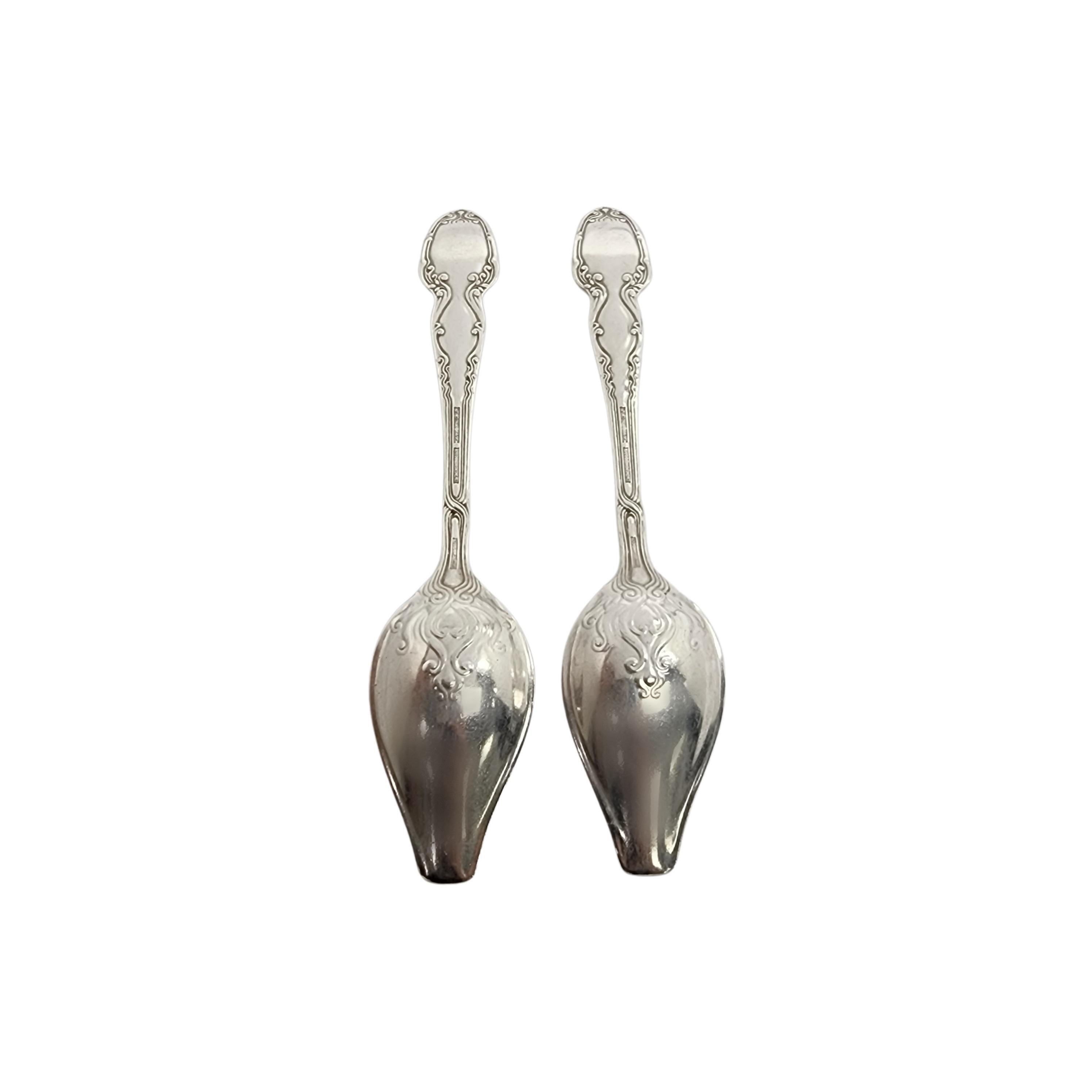 Set of 2 Tiffany & Co sterling silver grapefruit spoons in the Broom Corn pattern by Tiffany & Co with monogram.

Monogram appears to be ABH

Beautiful and unique grapefruit spoons in Tiffany's intricate and decorative Broom Corn pattern, designed
