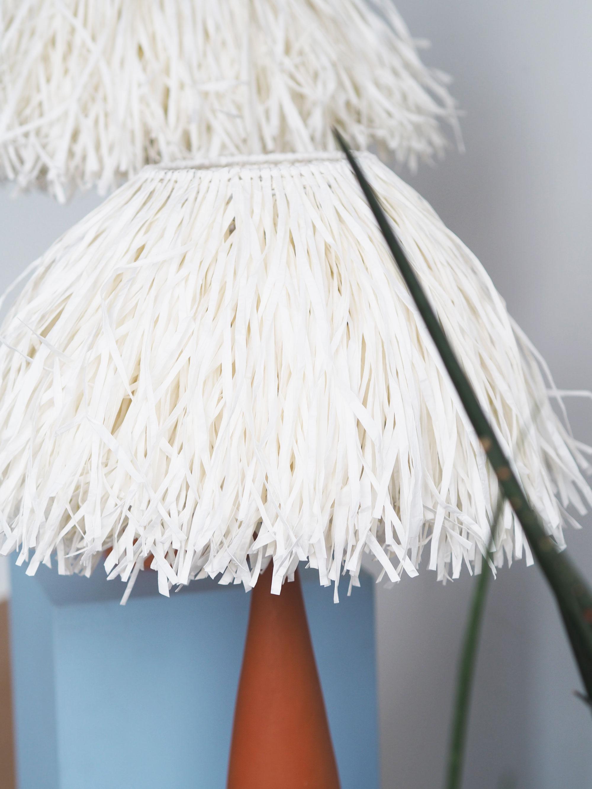 Laiton Ensemble de 2 lampes Tiki de Tero Kuitunen en vente