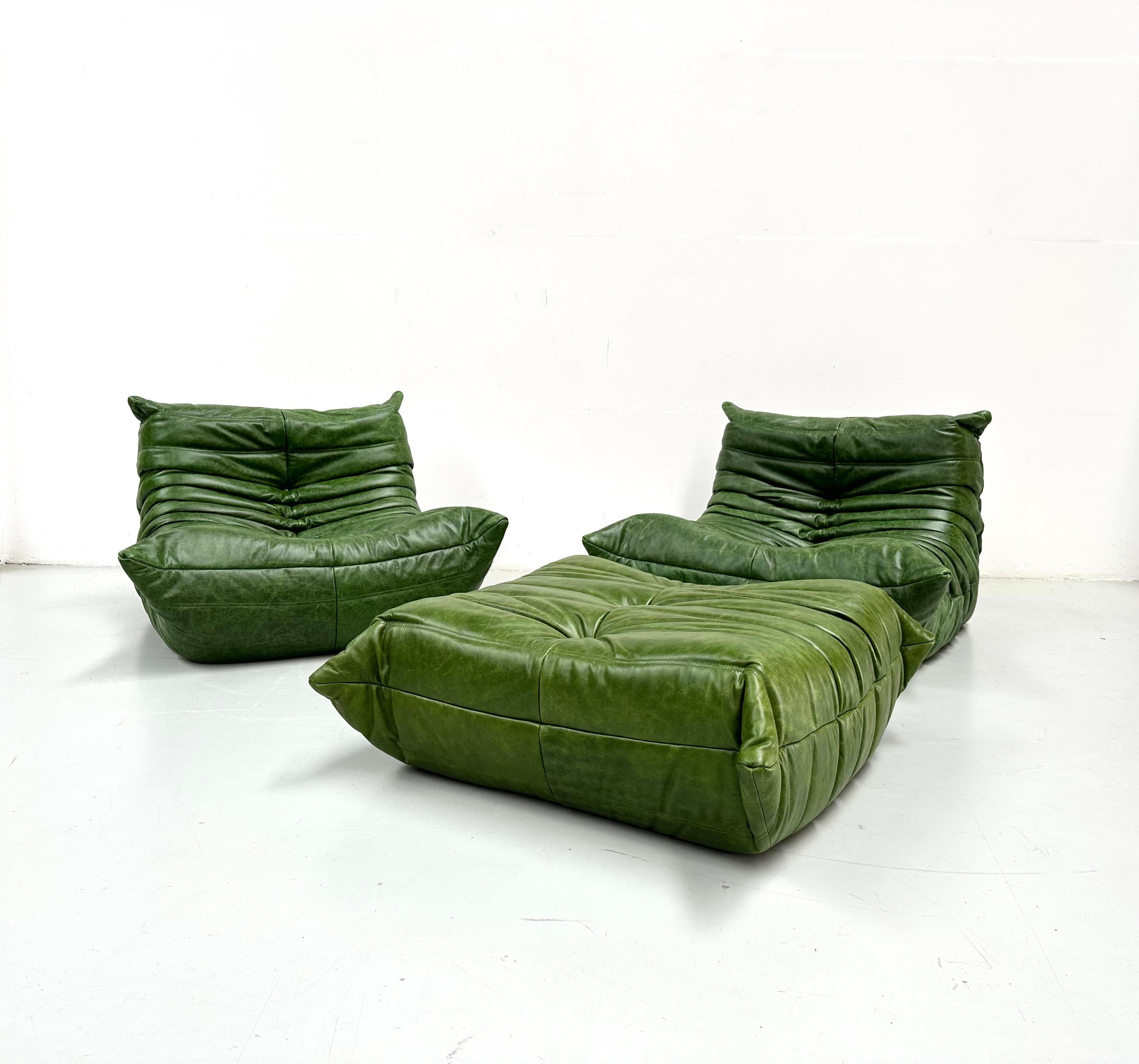 French Set of 2 Togo Chairs and Ottoman in Green Leather by M. Ducaroy for Ligne Roset.