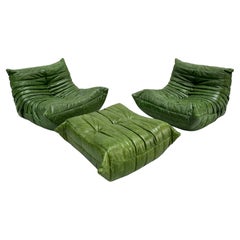Vintage Set of 2 Togo Chairs and Ottoman in Green Leather by M. Ducaroy for Ligne Roset.