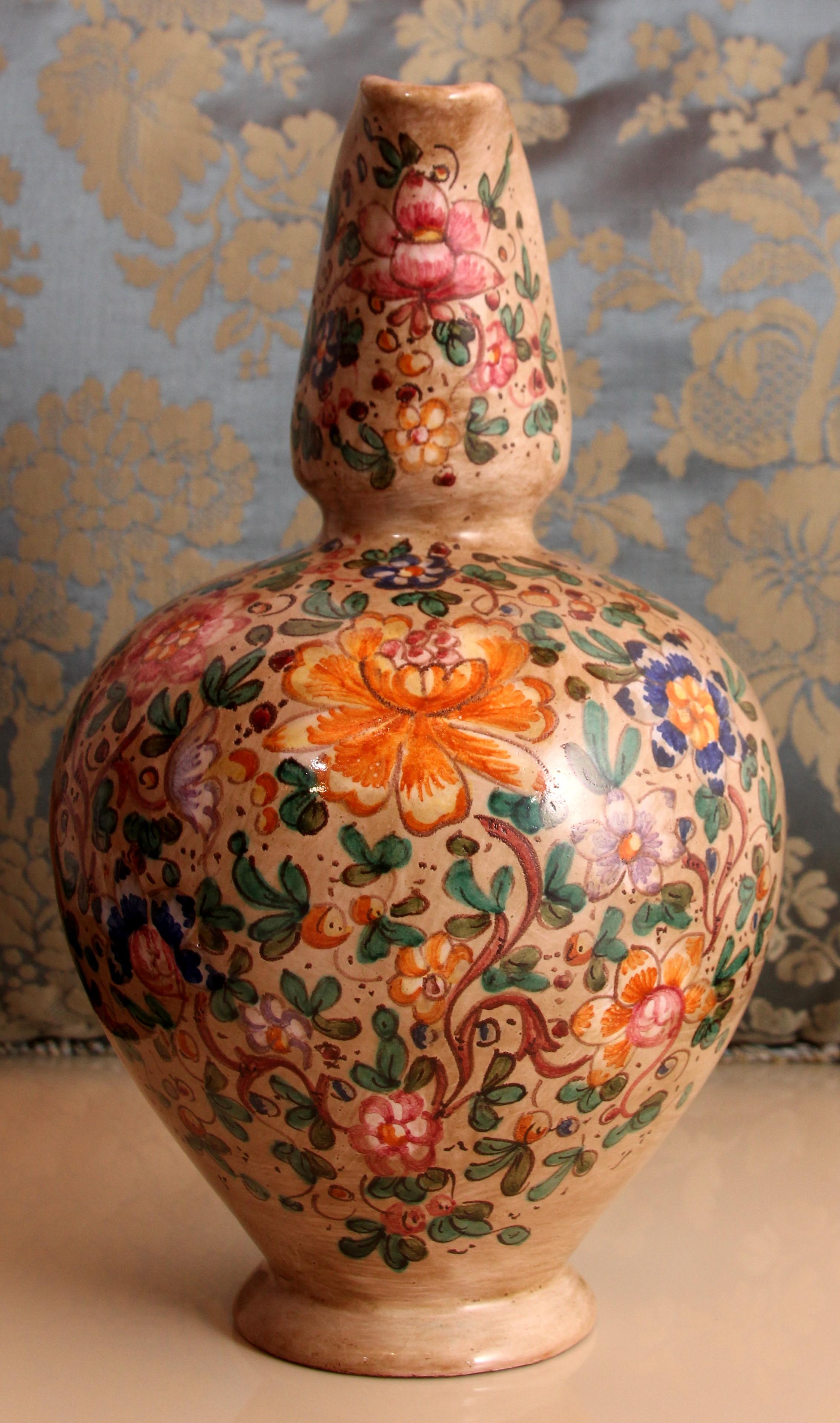 

Période de conception 	1955 à 1965
Période de production 	vers 1960 
Pays de fabrication Italie Gubbio Umbria (Provincia di Perugia) 

MARQUÉ : par l'artiste C.A.I.C. Gubbio
:-:très bon état
Pichet à vin : 29cm de haut ~ Pichet à lait ou à eau :