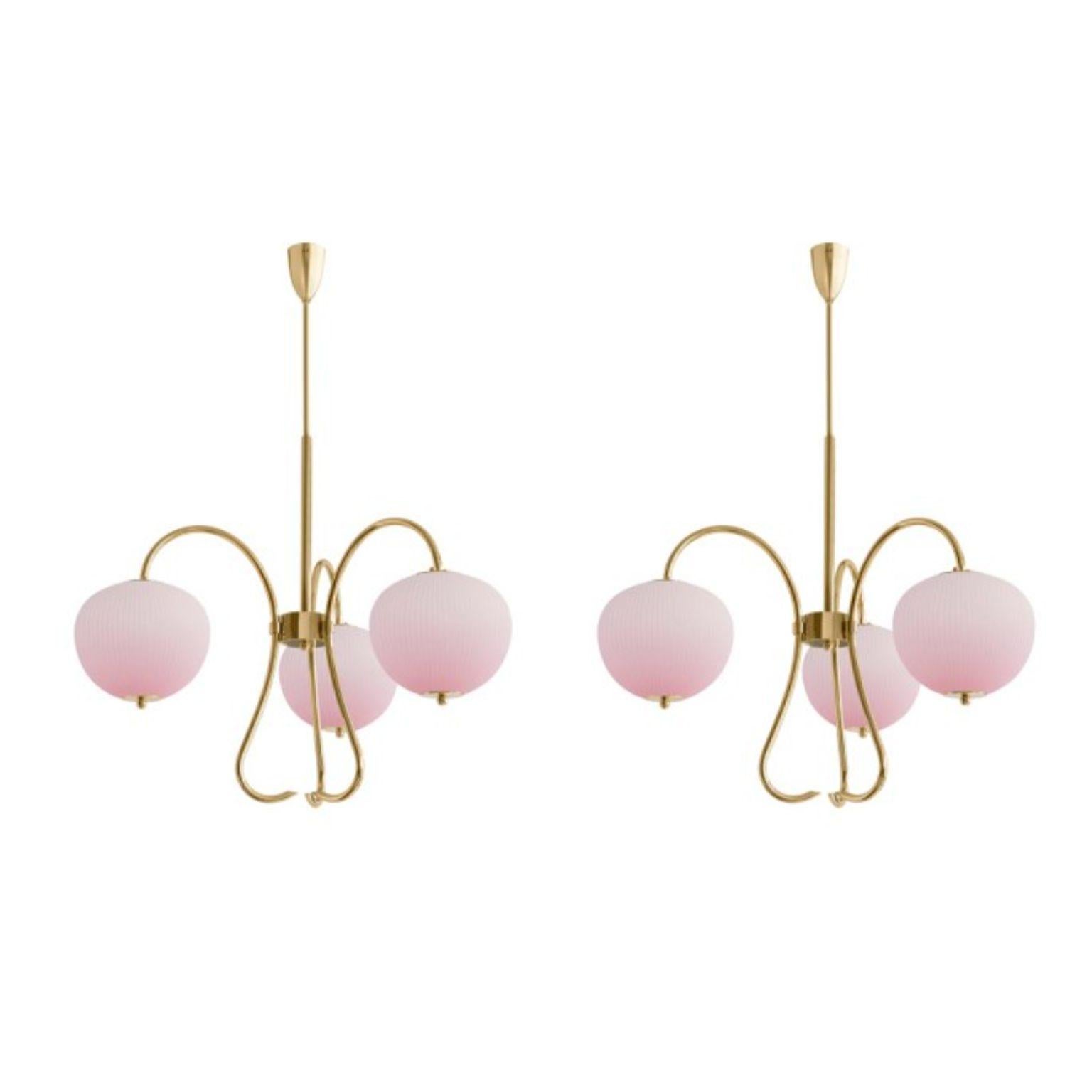 Triple chandelier China 03 by Magic Circus Editions
Dimensions: H 120 x W 81.5 x D 26.2 cm
Materials: Brass, mouth blown glass sculpted with a diamond saw
Colour: soft rose

Available finishes: Brass, nickel
Available colors: enamel soft