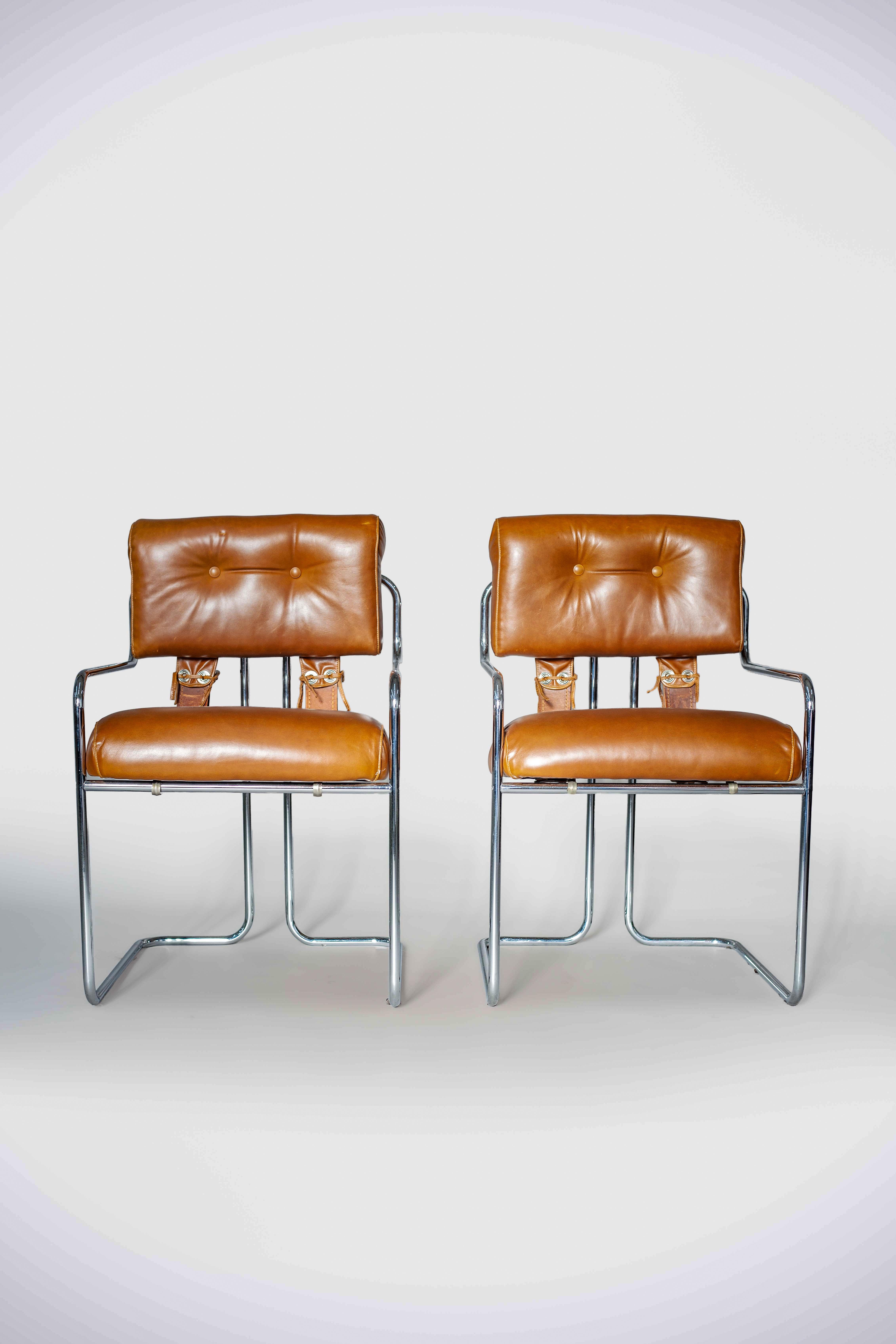 Set of 2 chairs by Guido Faleschini for I4 Mariani. Vintage Italian circa 1970s. Chromed steel tubing, brown leather newly reupholstered in excellent condition. 

