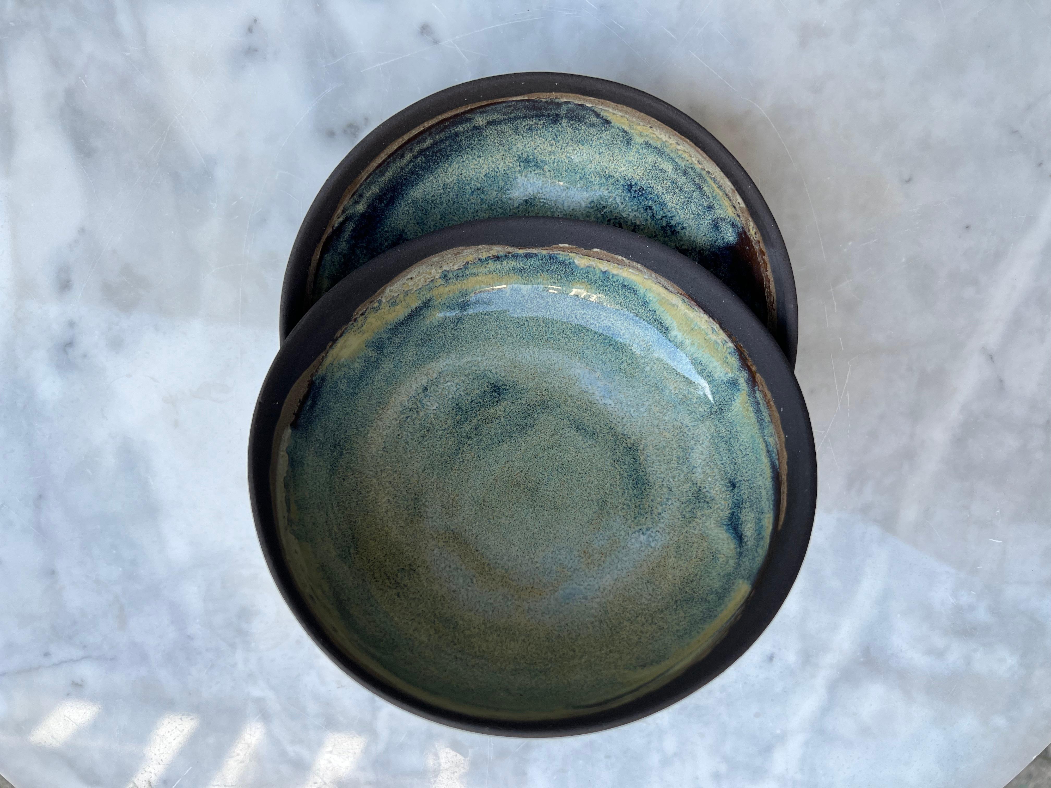Set of 2 Turquoise Bowl by Güler Elçi
Dimensions: Small: D 15 x H 5 cm
Large: D 21 x H 5 cm
Materials: Stoneware Ceramic, Food Safe Glaze.

Güler Elçi is a ceramic artist based in Istanbul. In the light of her engineering career, she considers