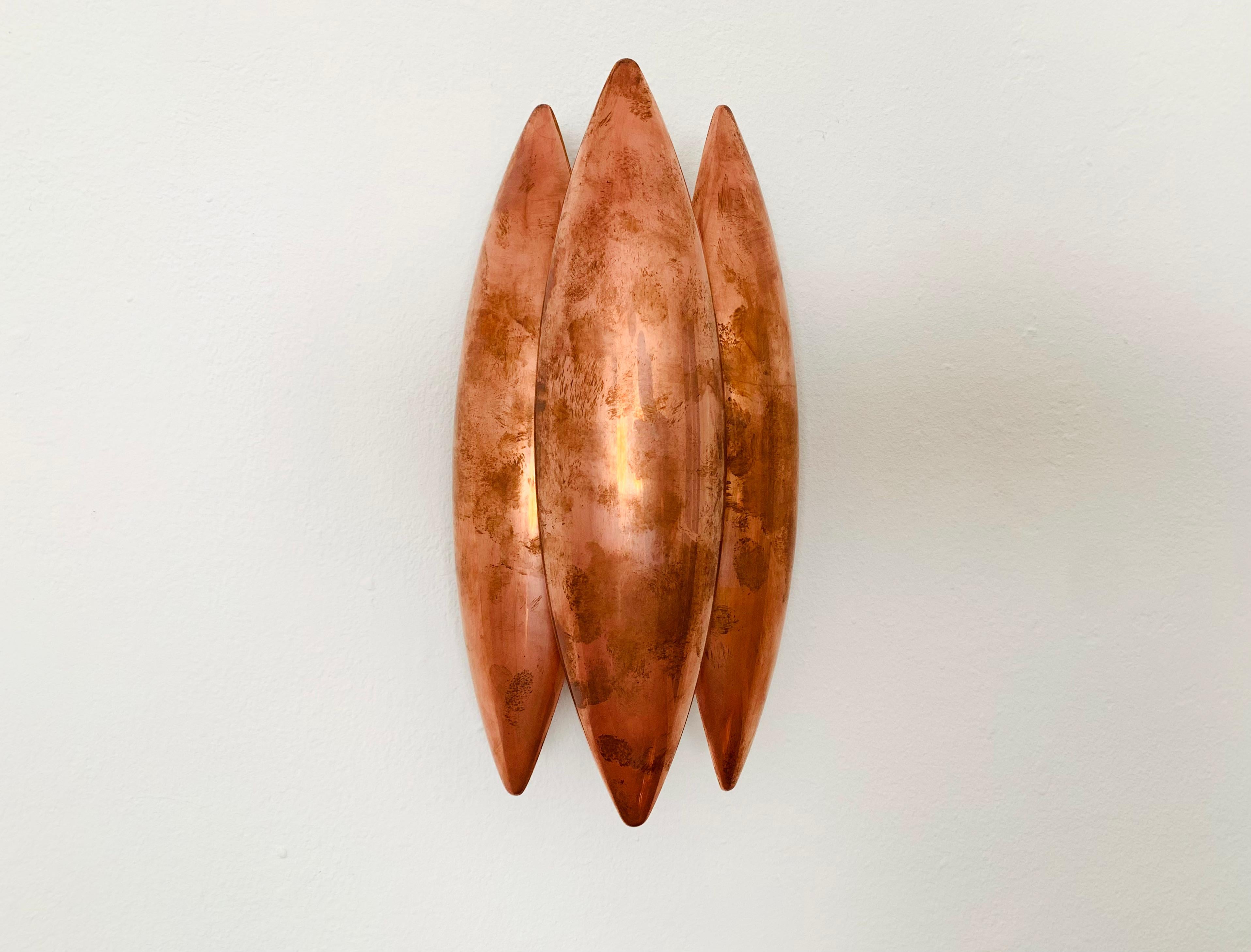 Very beautiful and uniquely patinated Kastor wall lamps from the 1960s.
Impressively beautiful and contemporary design.
A spectacular play of light is created.

Manufacturer: Fog and Morup
Design: Jo Hammerborg

Condition:

Very good