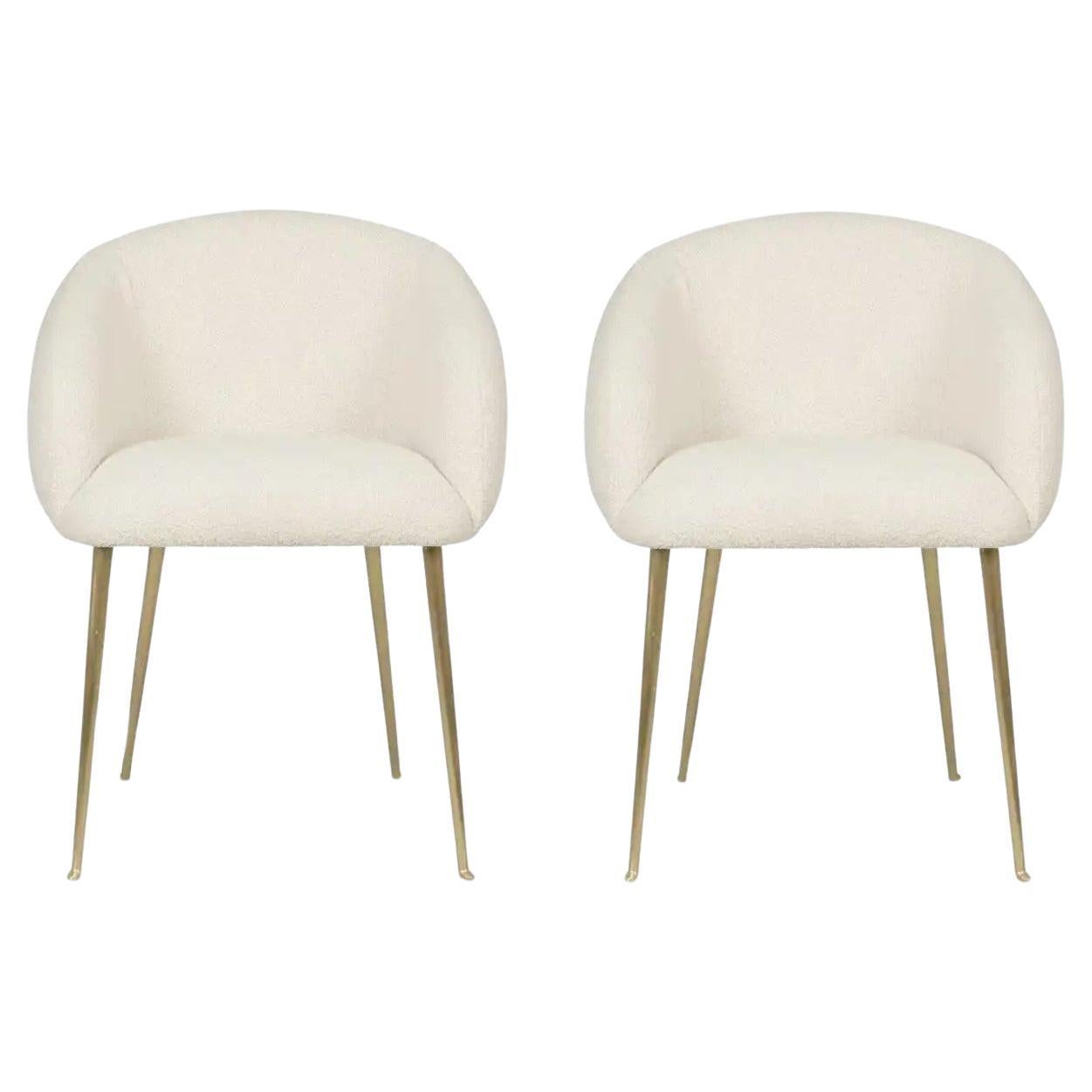 Set Of 2 Upholstered Dining Chairs With Tapered Legs in Brass.