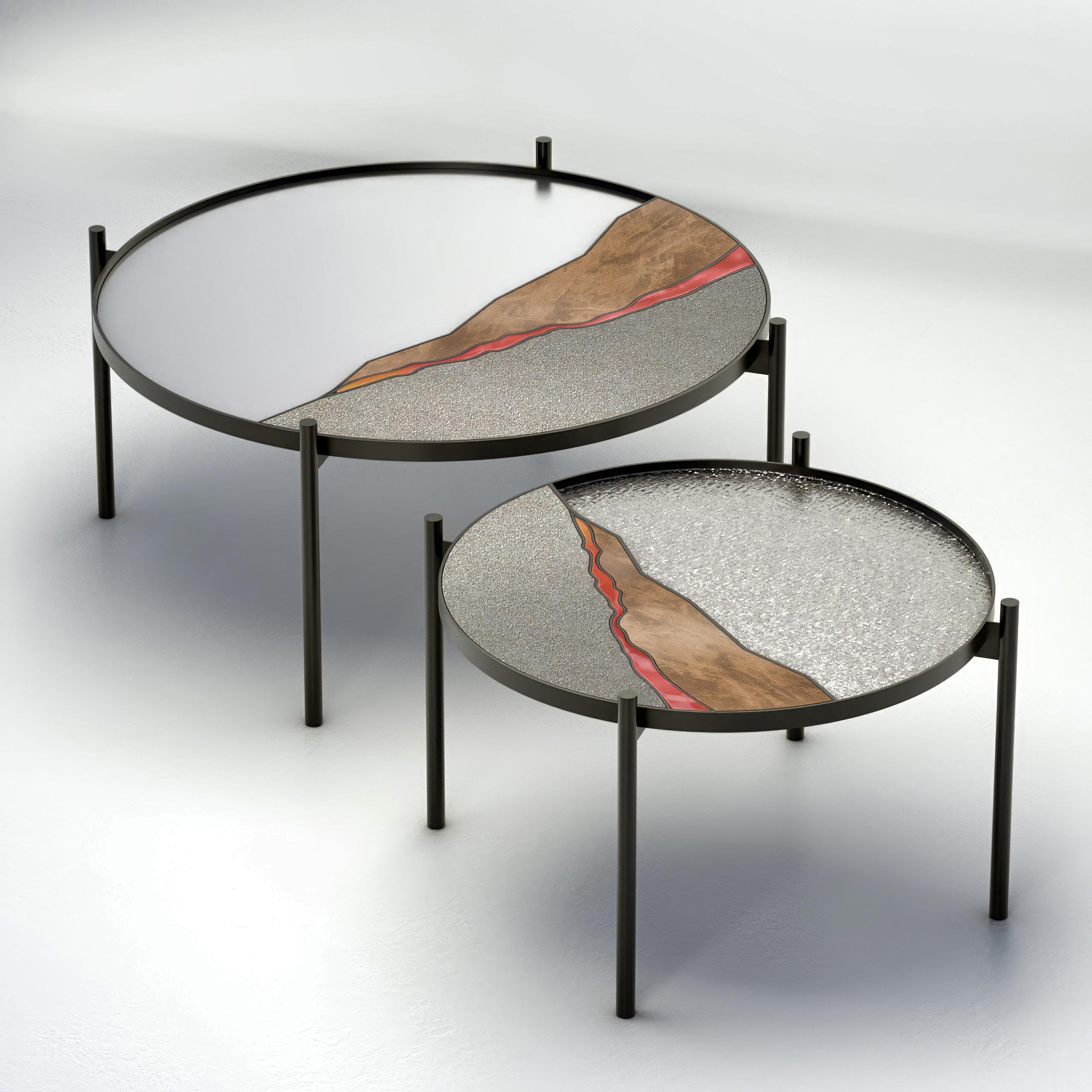 Set Of 2 Vesuvius Coffee Tables by Atlas Project
Dimensions: Big: Ø 85 x H 38 cm. 
Small:Ø 65 x H 38 cm
Materials: Black powder painted iron, stainless steel mirror, lava stone, glass fusion handpainted, and copper.

Available in two different