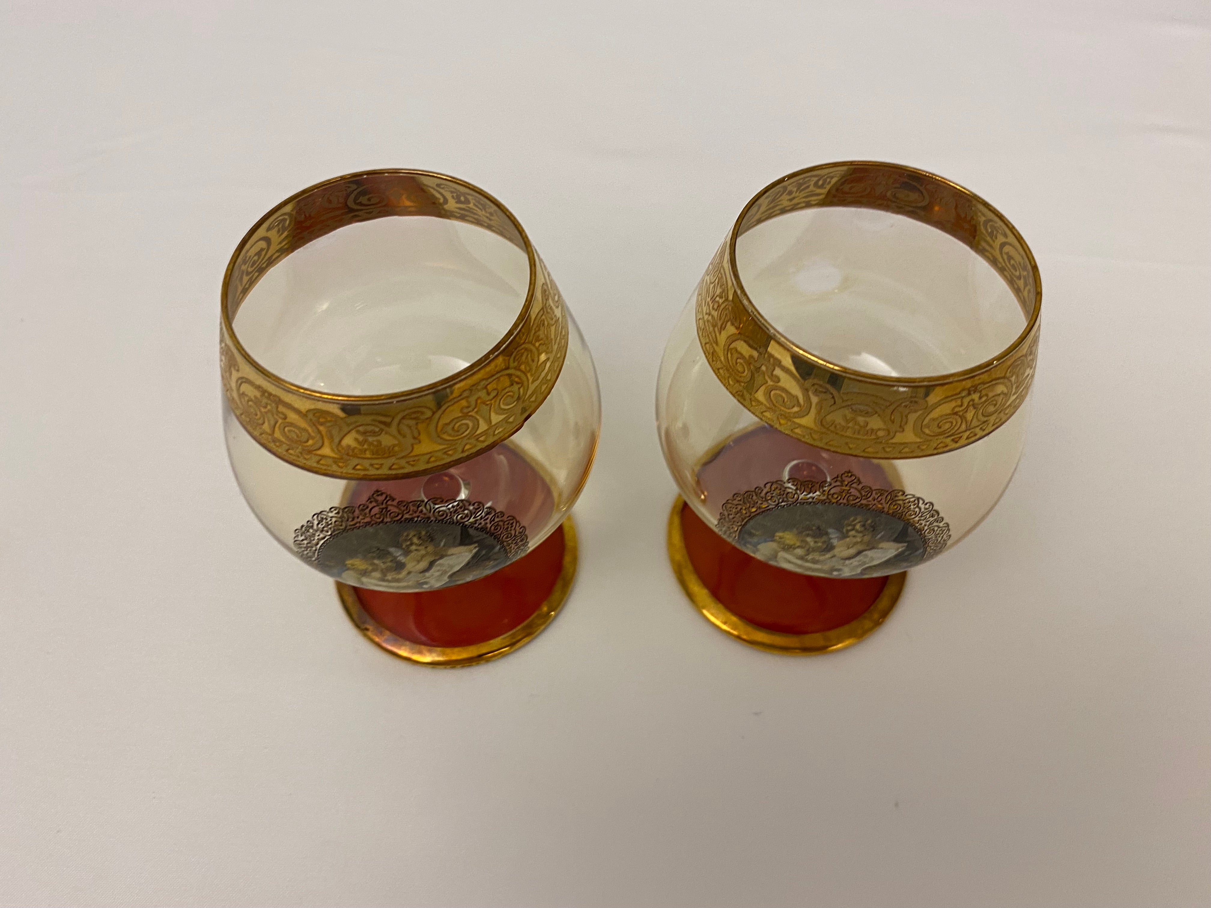 A fine vintage pair of cognac or liquor glasses, Via Veneto old world quality by Spiegelau. Wonderful hand painted gilded gold Cordial Glasses, circa 1940 from Italy. 

Matching rose, gold rose base. Each measures 2 3/4