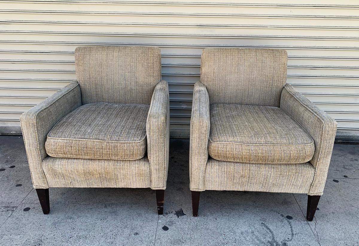 Beautiful pair of vintage chairs designed and manufactured in the USA in the early to mid-1960s.

The chairs have beautiful lines, they have rounded backs with slight slant, they are very comfortable, they retain the original upholstery and they