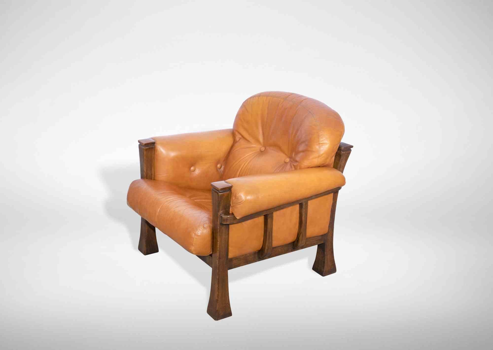 Das Set aus 2 Vintage-Sesseln ist ein originelles Designobjekt, das in den 1970er Jahren von Italian Production in Italien hergestellt wurde.

Holz und Leder,

Ausgezeichneter Zustand.

Abmessungen: H 82 / L. 95 / P 80 Sitzfläche 44 cm.
 