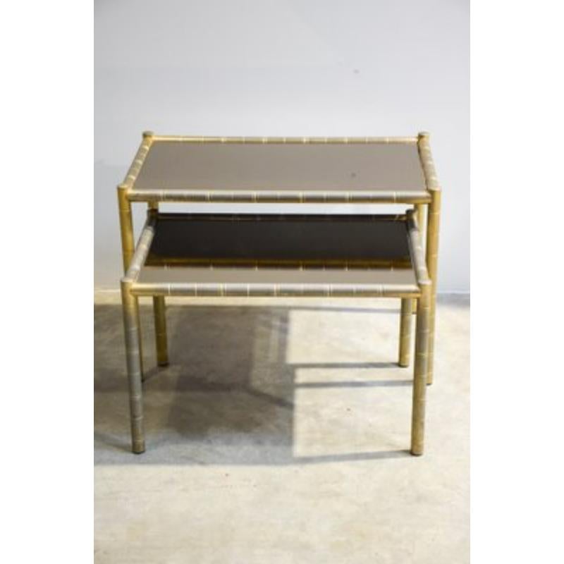 Set of 2 Vintage Brass-Plated Coffee Tables in Bamboo, 1970s

Vintage Design
Lower brass and glass tables. The largest measures 45cm high, 65cm long, 37cm deep. The smallest measures 37 cm in height, 57 cm in length and 37cm deep.

Additional