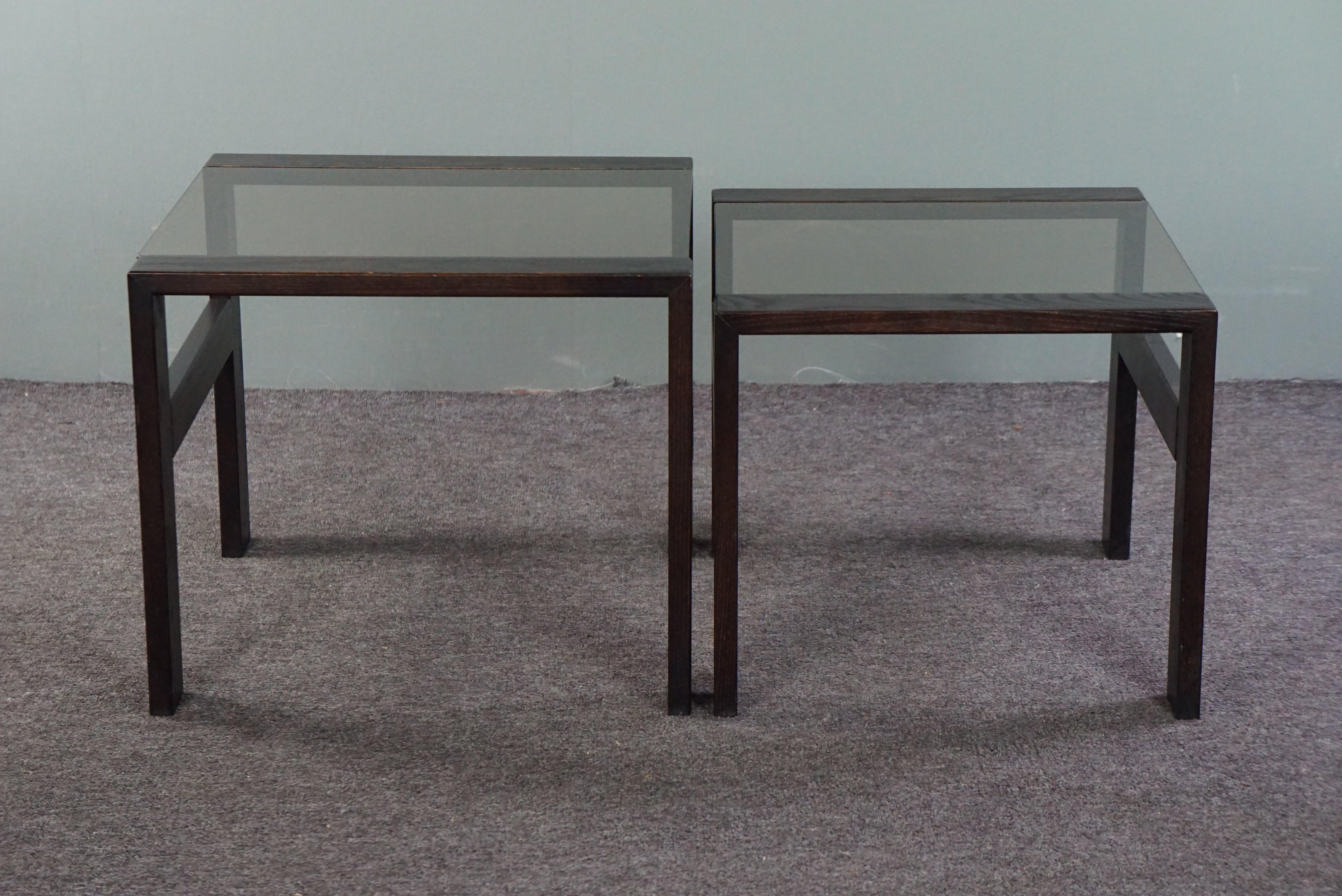 Glass Set of 2 vintage coffee tables or side tables from the 1970s, made of wood and g For Sale