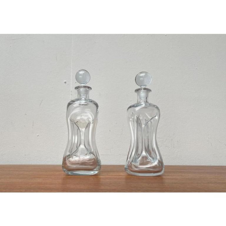 Vintage Danish Kluk Kluk Bottles in Glass from Holmegaard, 1970s, Set of 2, in Very Good conditions. Vintage By 1970 à 1979 preuves officielles d'authenticité telles que les catalogues d'époque, les dossiers de créateurs.

Informations