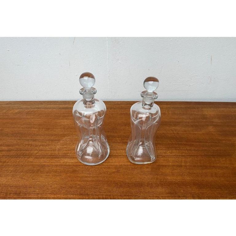 Danois Ensemble de 2 bouteilles danoises Kluk en verre de Holmegaard 1970 en vente