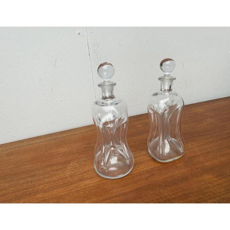 20ième siècle Ensemble de 2 bouteilles danoises Kluk en verre de Holmegaard 1970 en vente