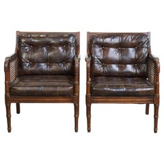 Set of 2 vintage design armchairs with wicker, wood and leather