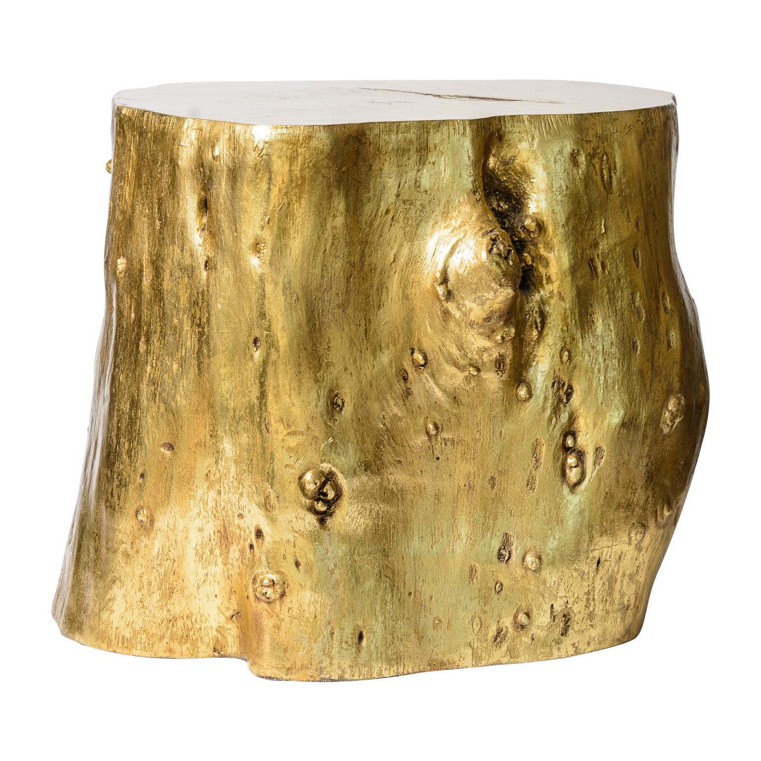 Set of two modern Tree Trunk Stumps made of cast resin and gold leafed.
This set looks very real and is not as heavy as wood. these are very versatile, could be used as tables or stools.
Very good preowned condition, consistent with use.