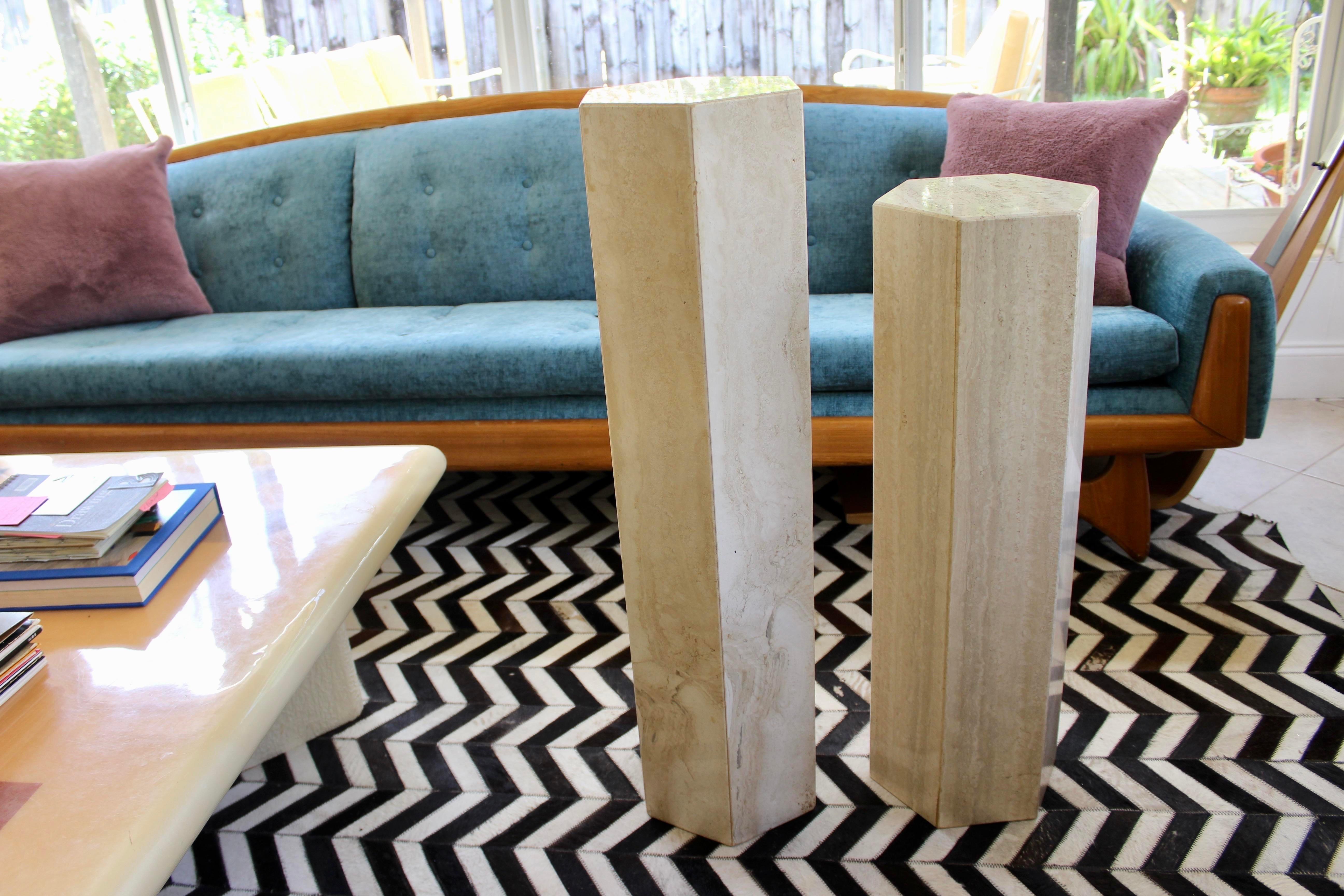 Set of two beautiful vintage midcentury modern polished marble pedestal columns. This set of pedestal columns features a modern/contemporary design, with clean lines and unique octagonal shape. The color is light neutral with warm beige and gray
