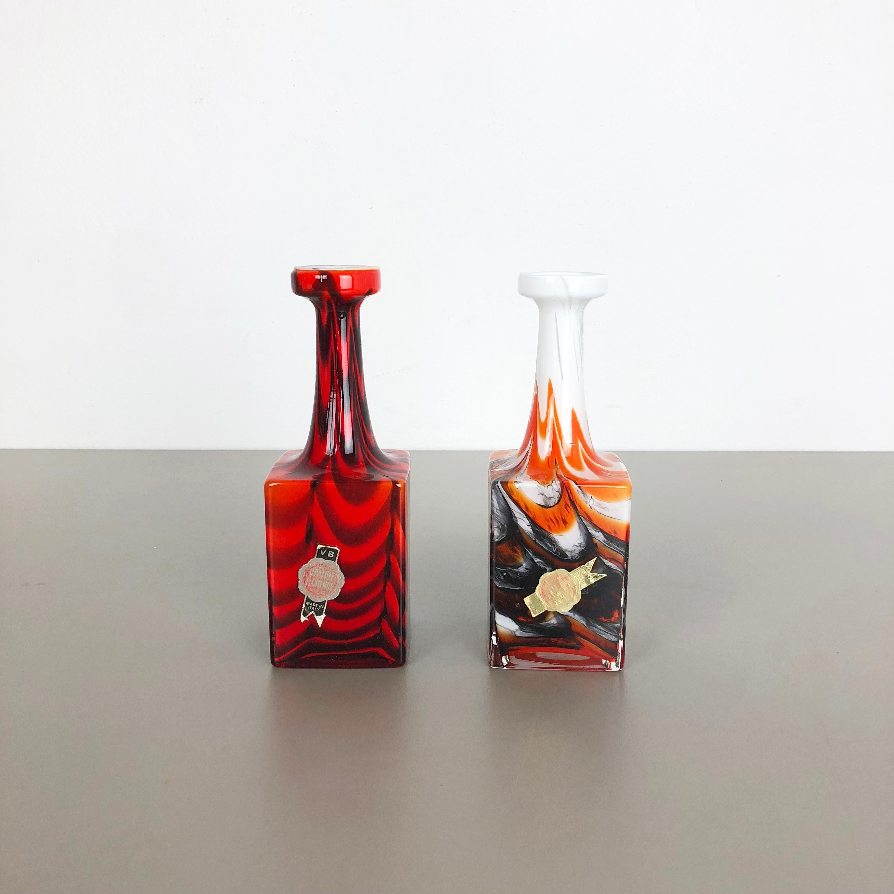 Article:

Pop Art vase set of 2


Producer:

Opaline Florence


Design:

Carlo Moretti



Decade:

1970s


Description:

original vintage 1970s Pop Art handblown vase set made in Italy by Opaline Florence. Made of high quality