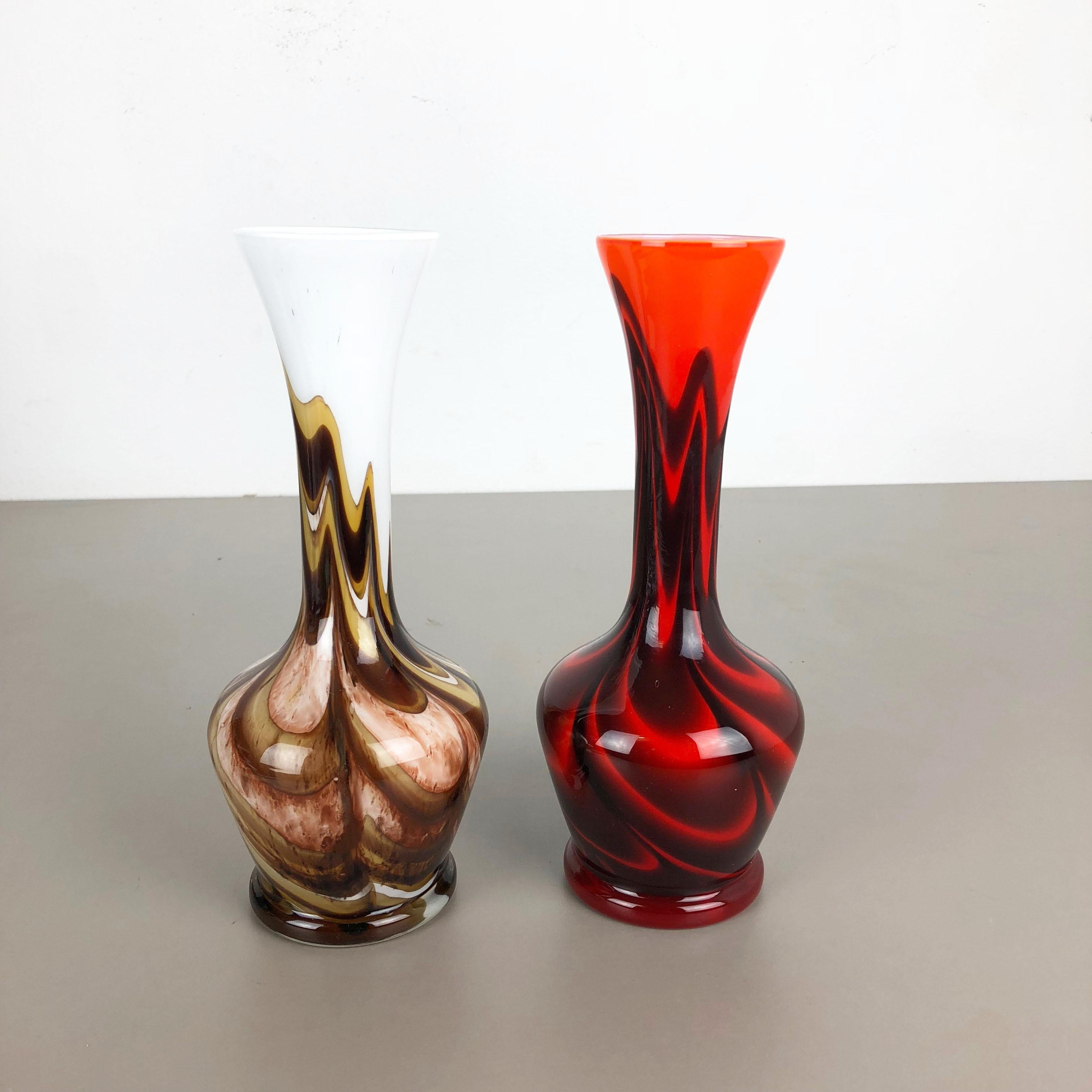 Article:

Pop Art vase set of 2


Producer:

Opaline Florence


Design:

Carlo Moretti



Decade:

1970s


Description:

original vintage 1970s Pop Art handblown vase set made in Italy by Opaline Florence. Made of high quality