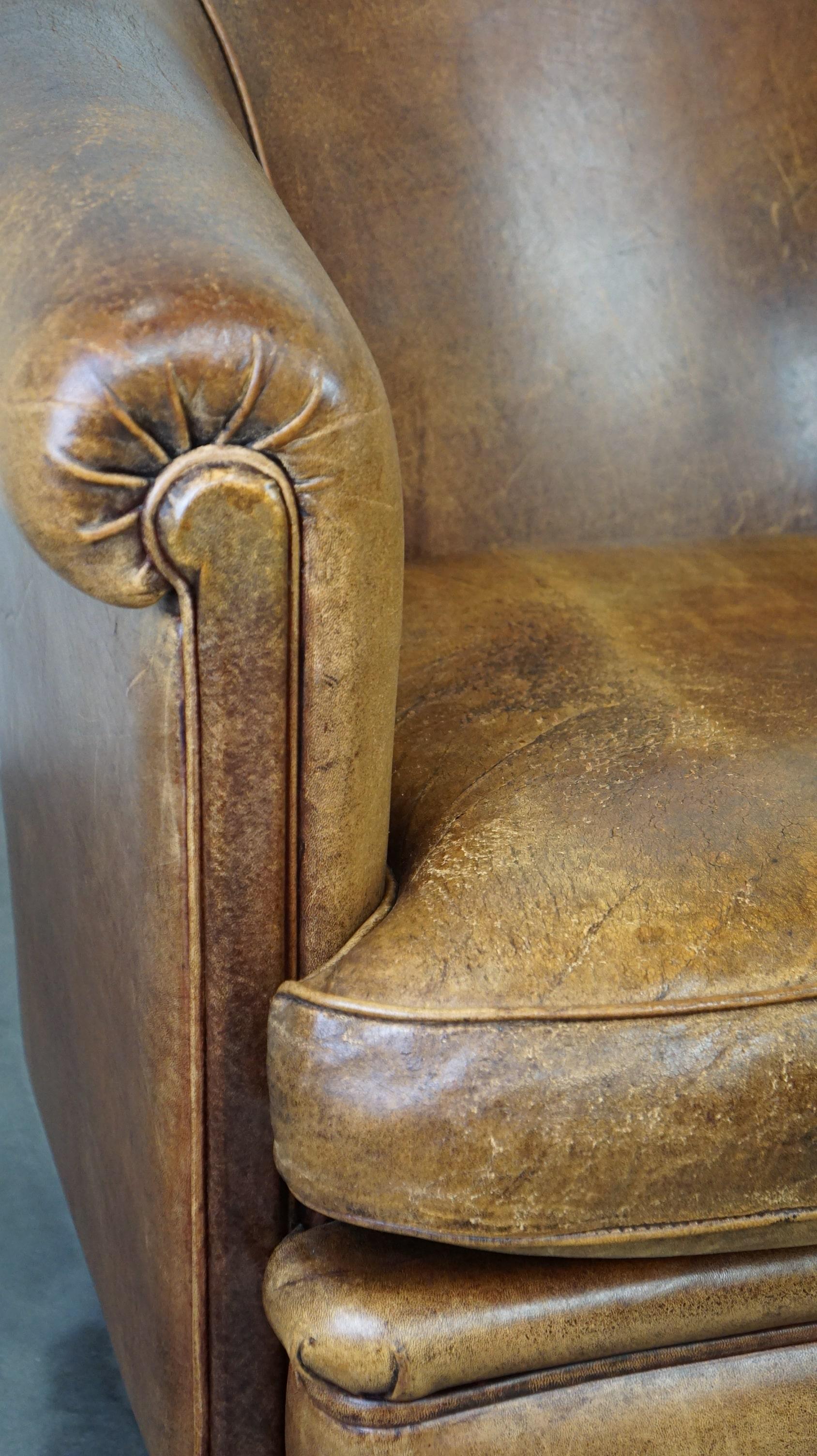 Set of 2 vintage sheep leather club chairs with a beautiful worn look 4