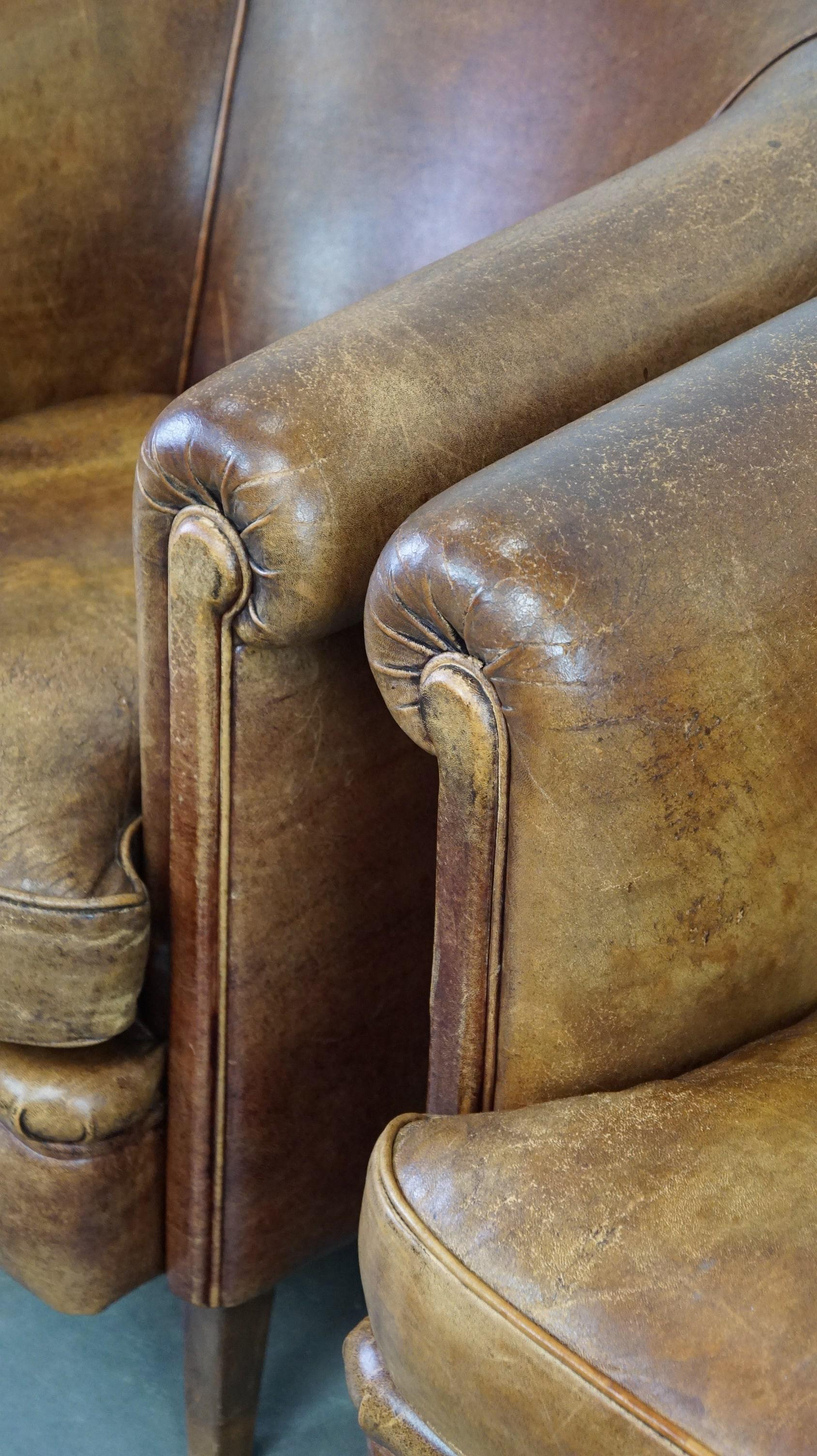 Set of 2 vintage sheep leather club chairs with a beautiful worn look 5