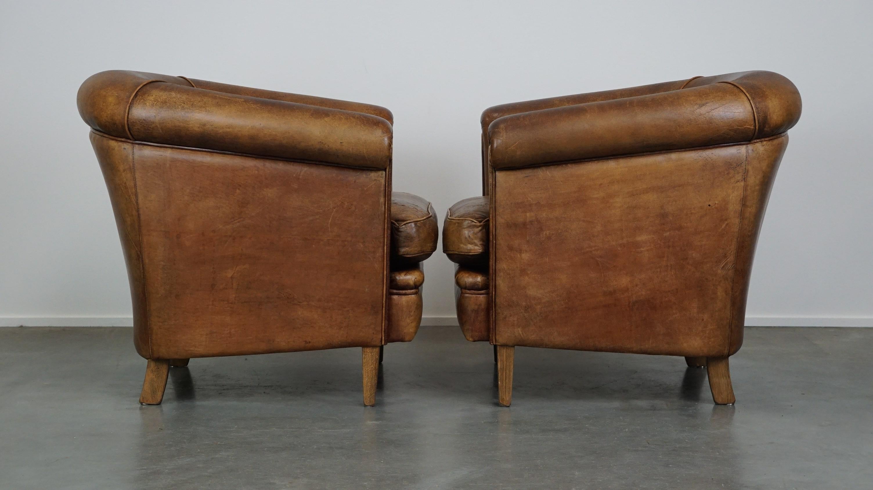 Dutch Set of 2 vintage sheep leather club chairs with a beautiful worn look