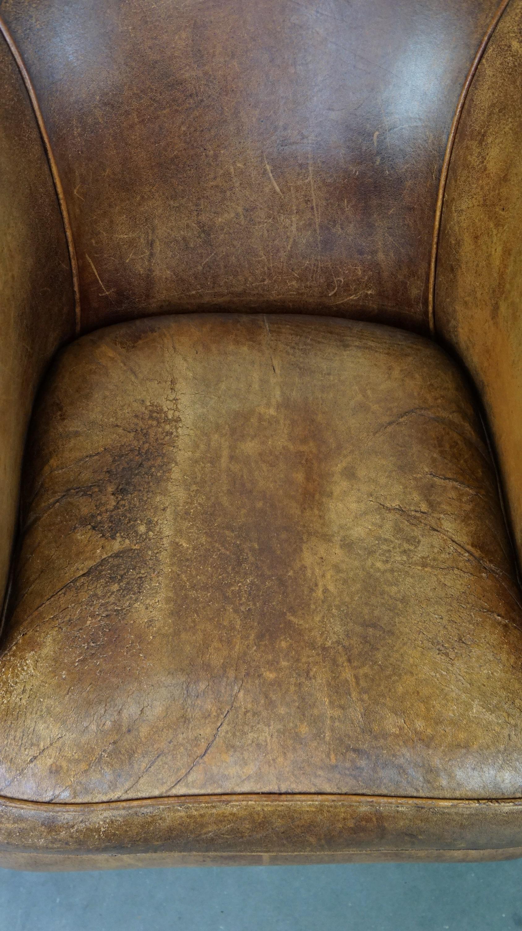 Contemporary Set of 2 vintage sheep leather club chairs with a beautiful worn look