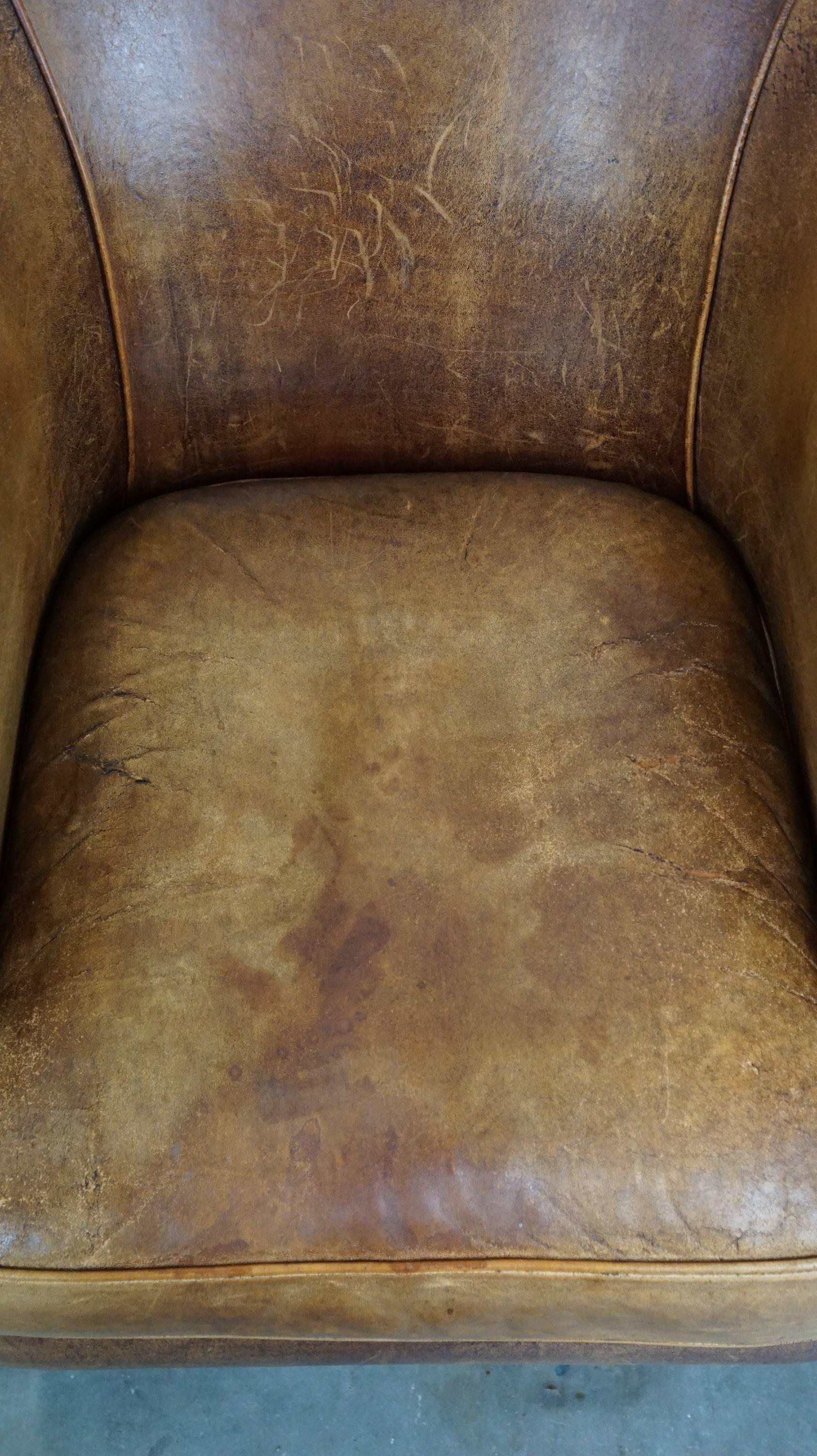 Leather Set of 2 vintage sheep leather club chairs with a beautiful worn look