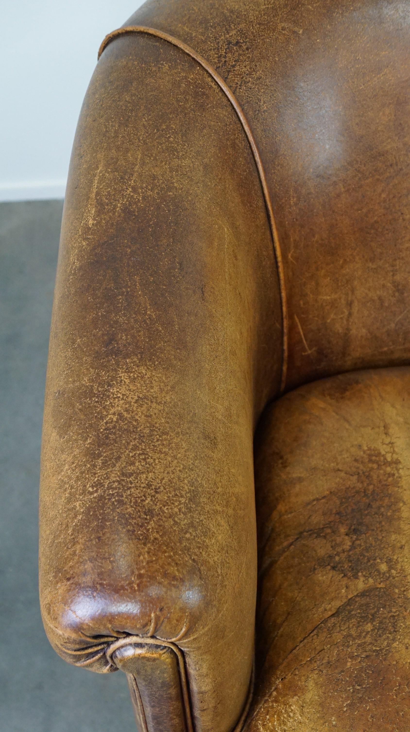 Set of 2 vintage sheep leather club chairs with a beautiful worn look 1