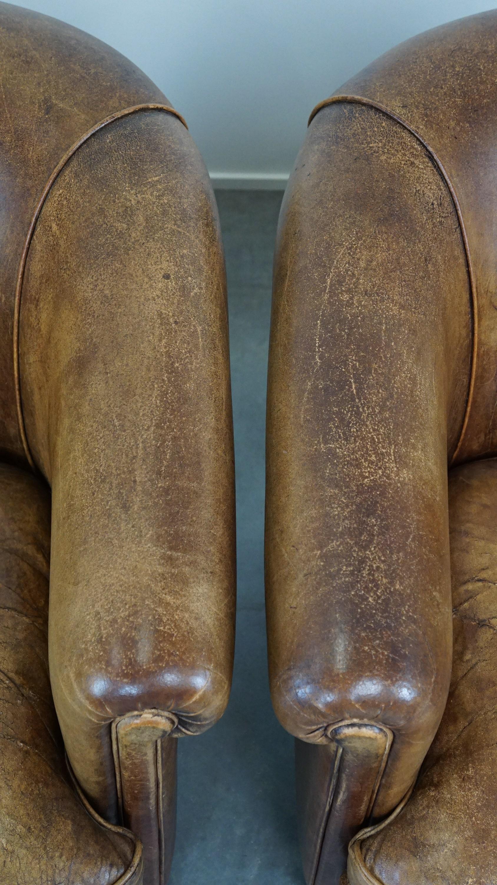 Set of 2 vintage sheep leather club chairs with a beautiful worn look 2