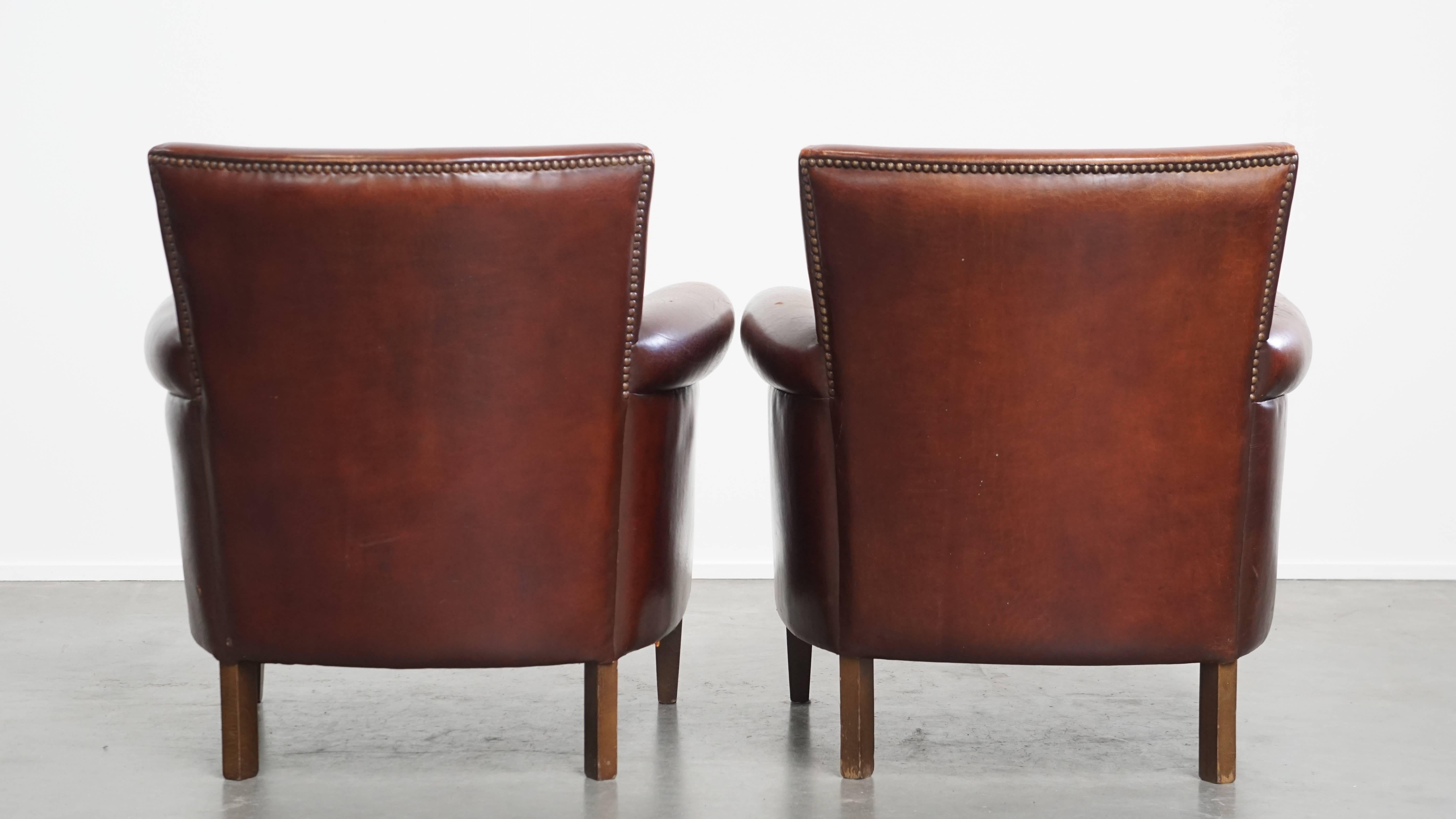 Classical Roman Set of 2 vintage sheepskin leather armchairs For Sale